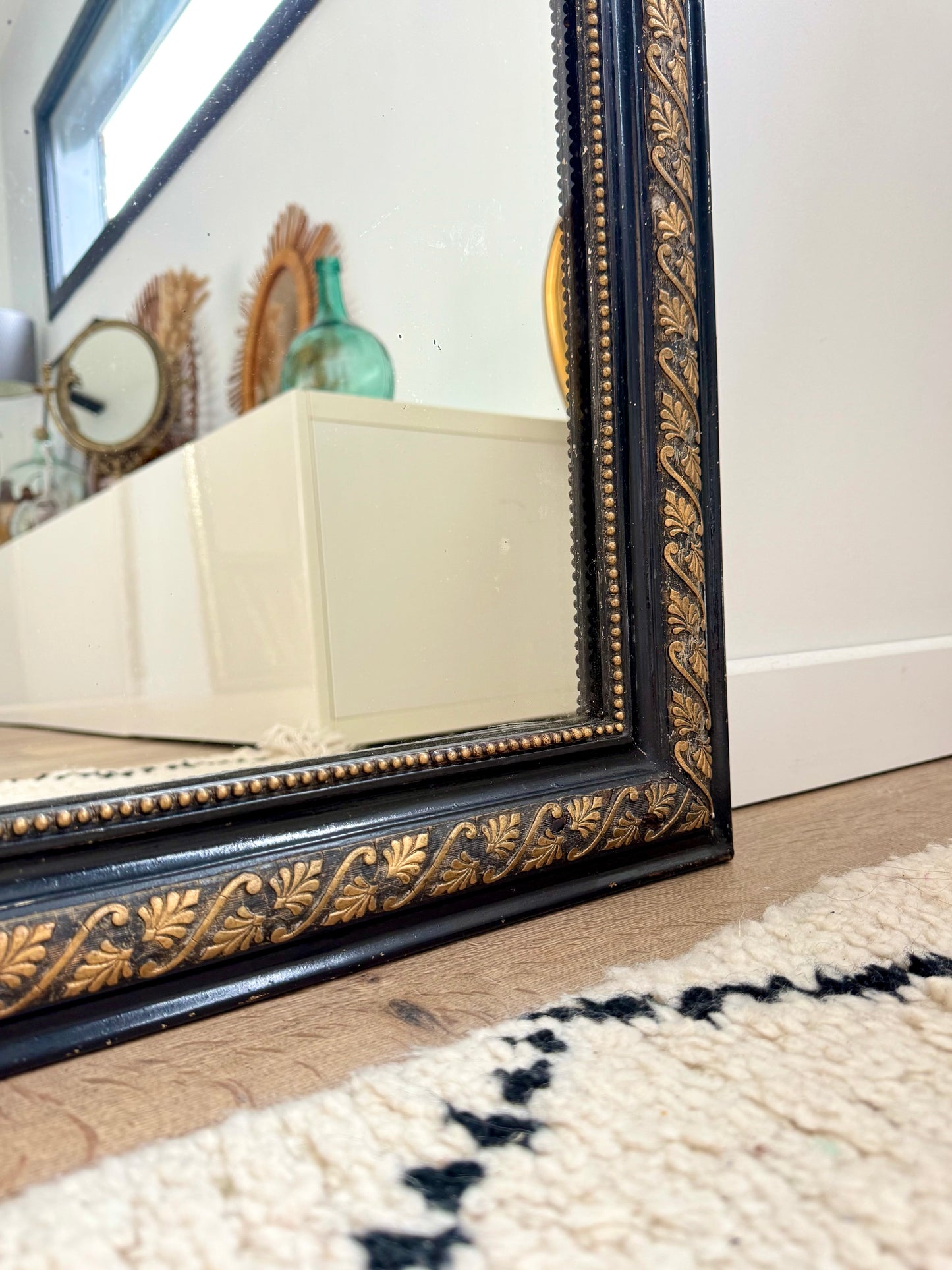 Miroir ancien Louis Philippe noir et doré