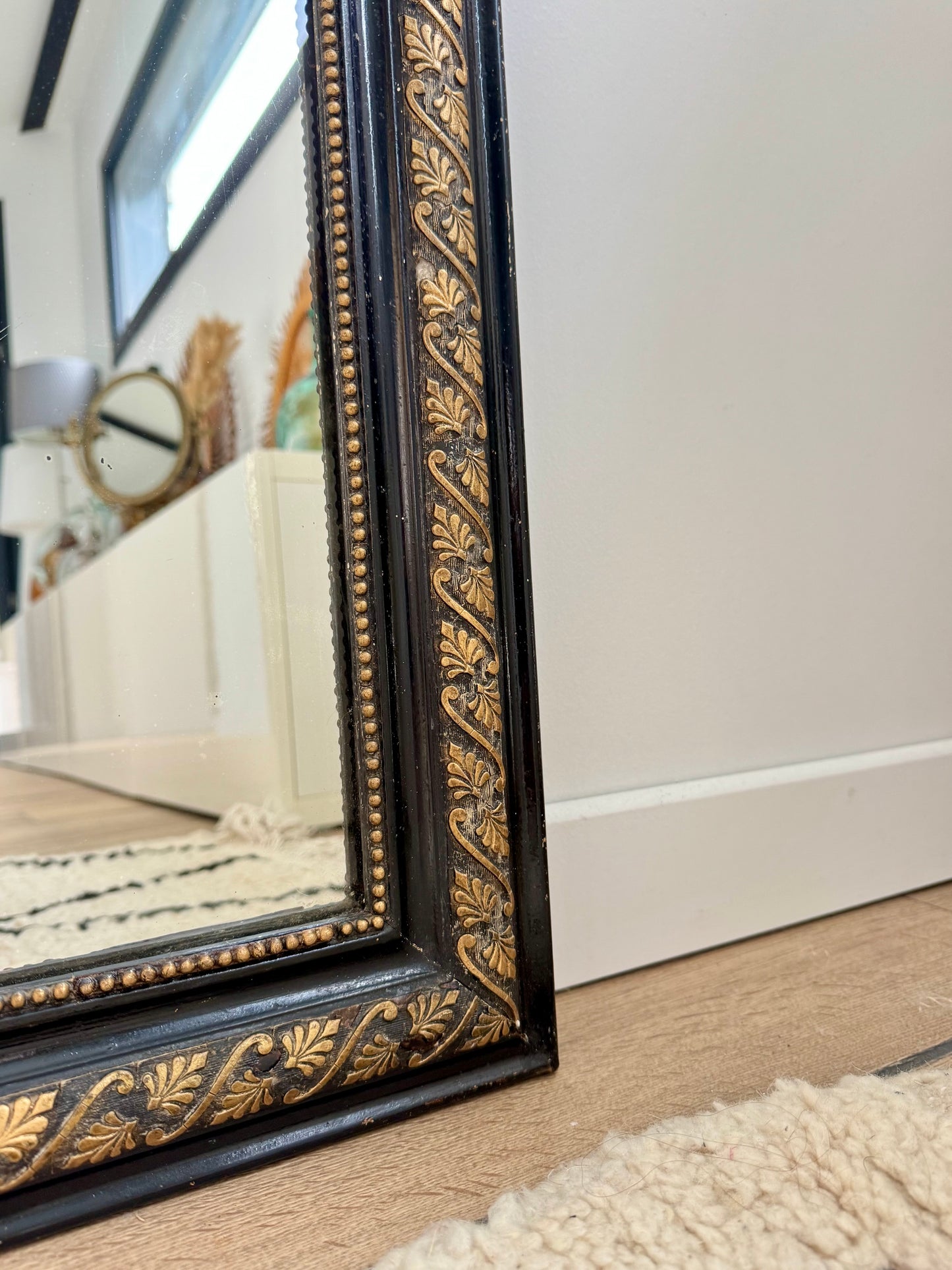 Miroir ancien Louis Philippe noir et doré