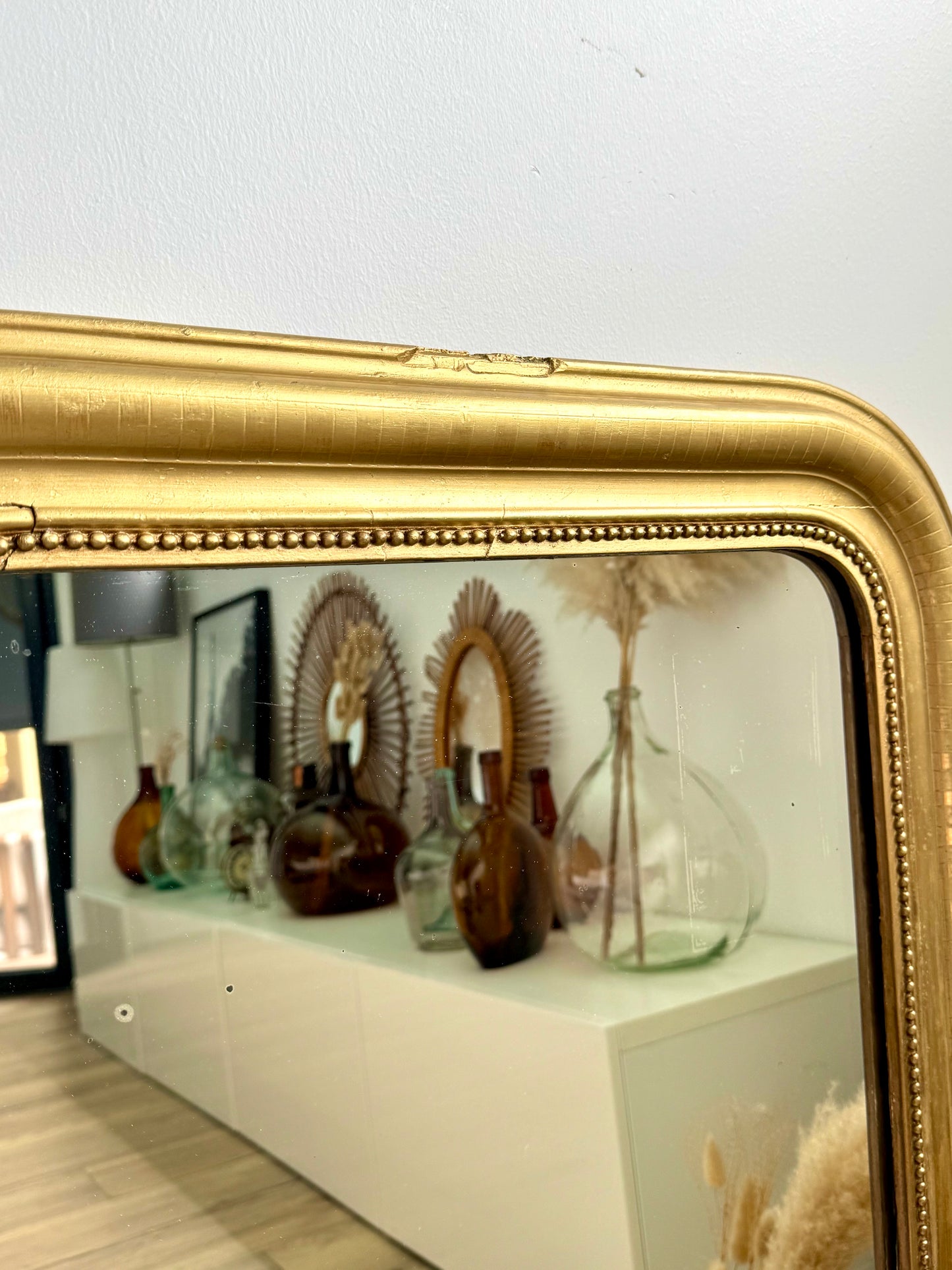 Miroir ancien Louis Philippe subtile feuille d’or