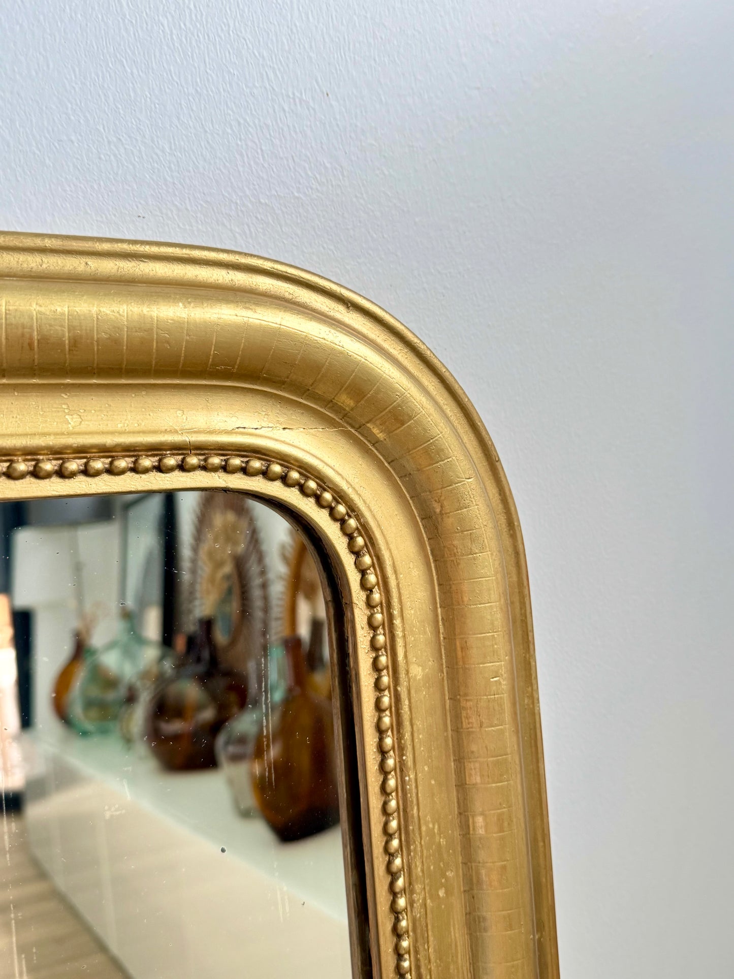 Miroir ancien Louis Philippe subtile feuille d’or