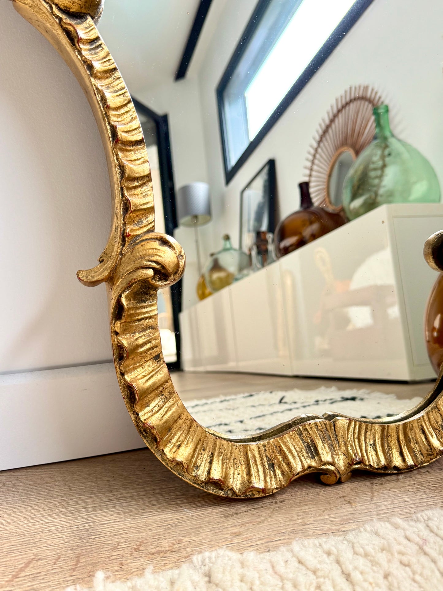 Miroir ancien doré de style baroque