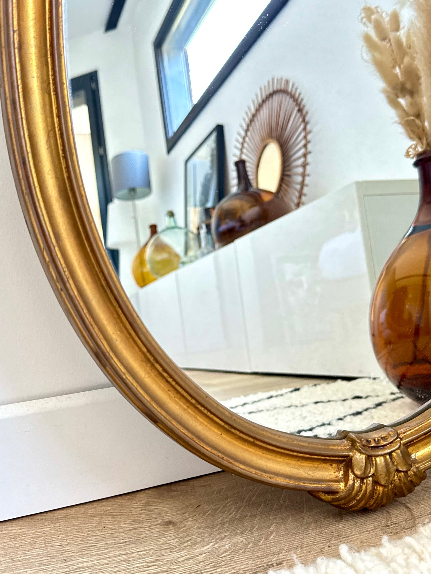 Miroir ovale doré
