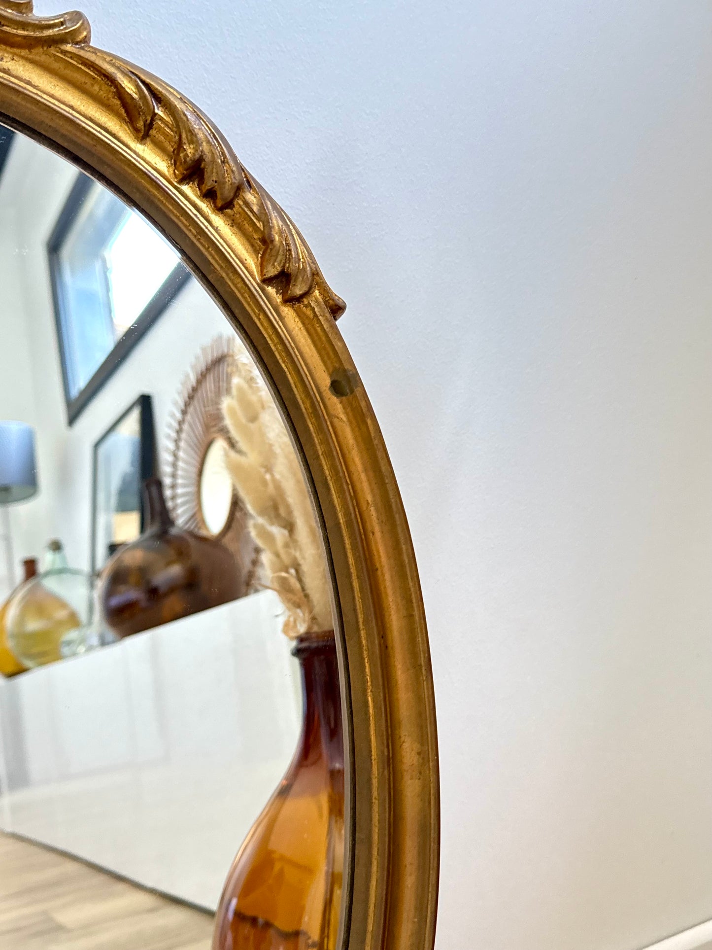 Miroir ovale doré