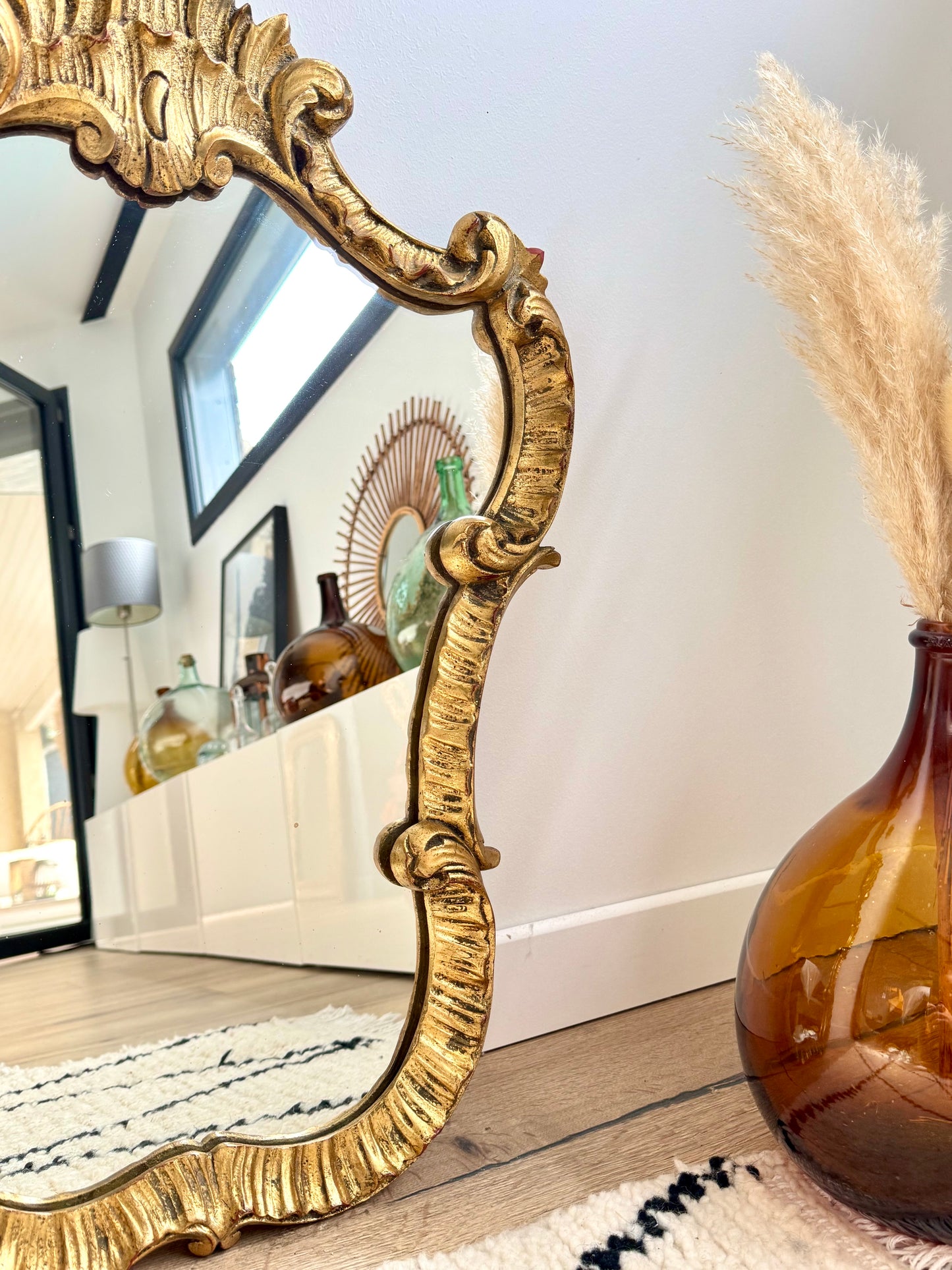 Miroir ancien doré de style baroque
