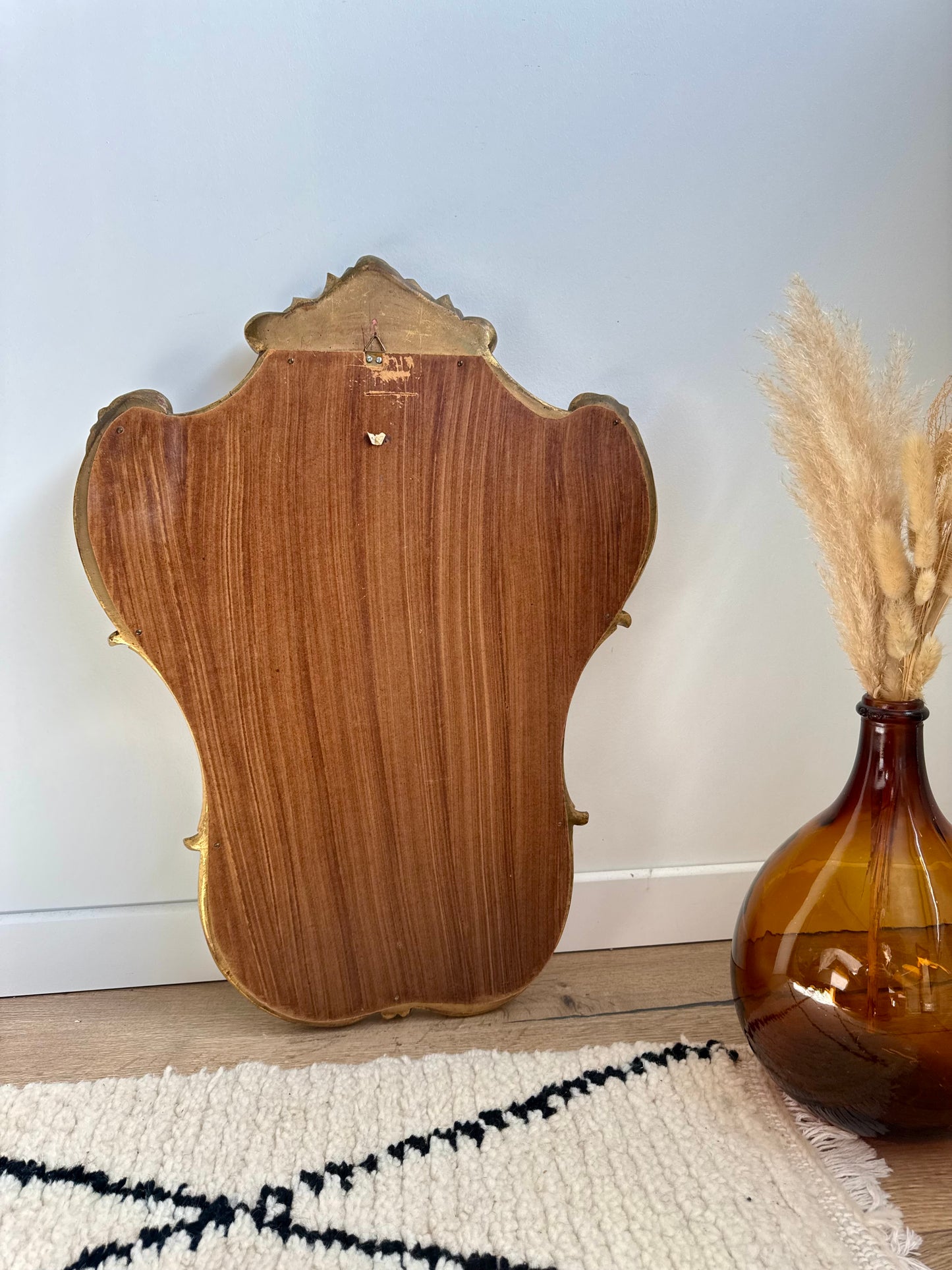 Miroir ancien doré de style baroque
