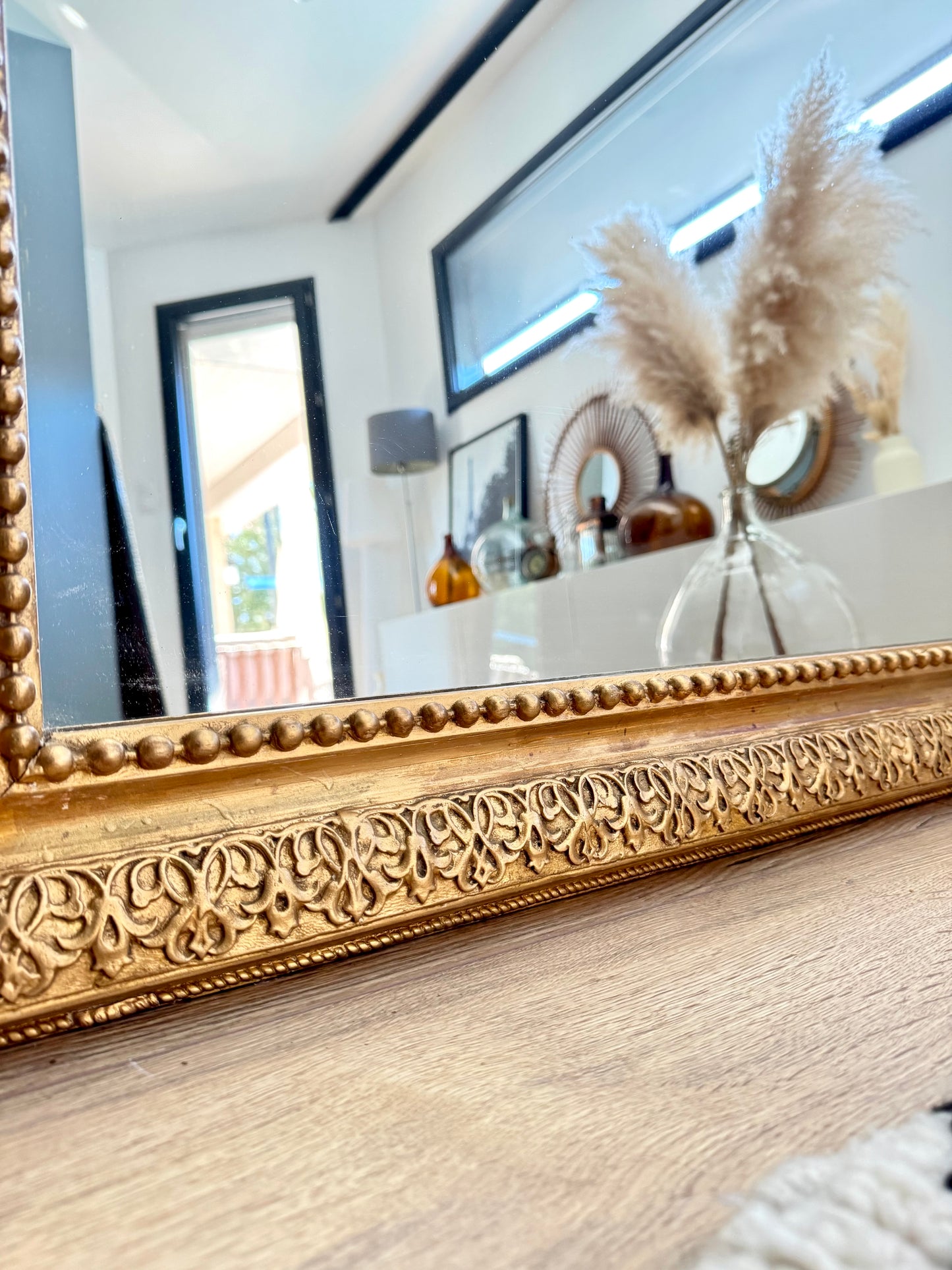 Grand miroir ancien doré à la feuille d'or