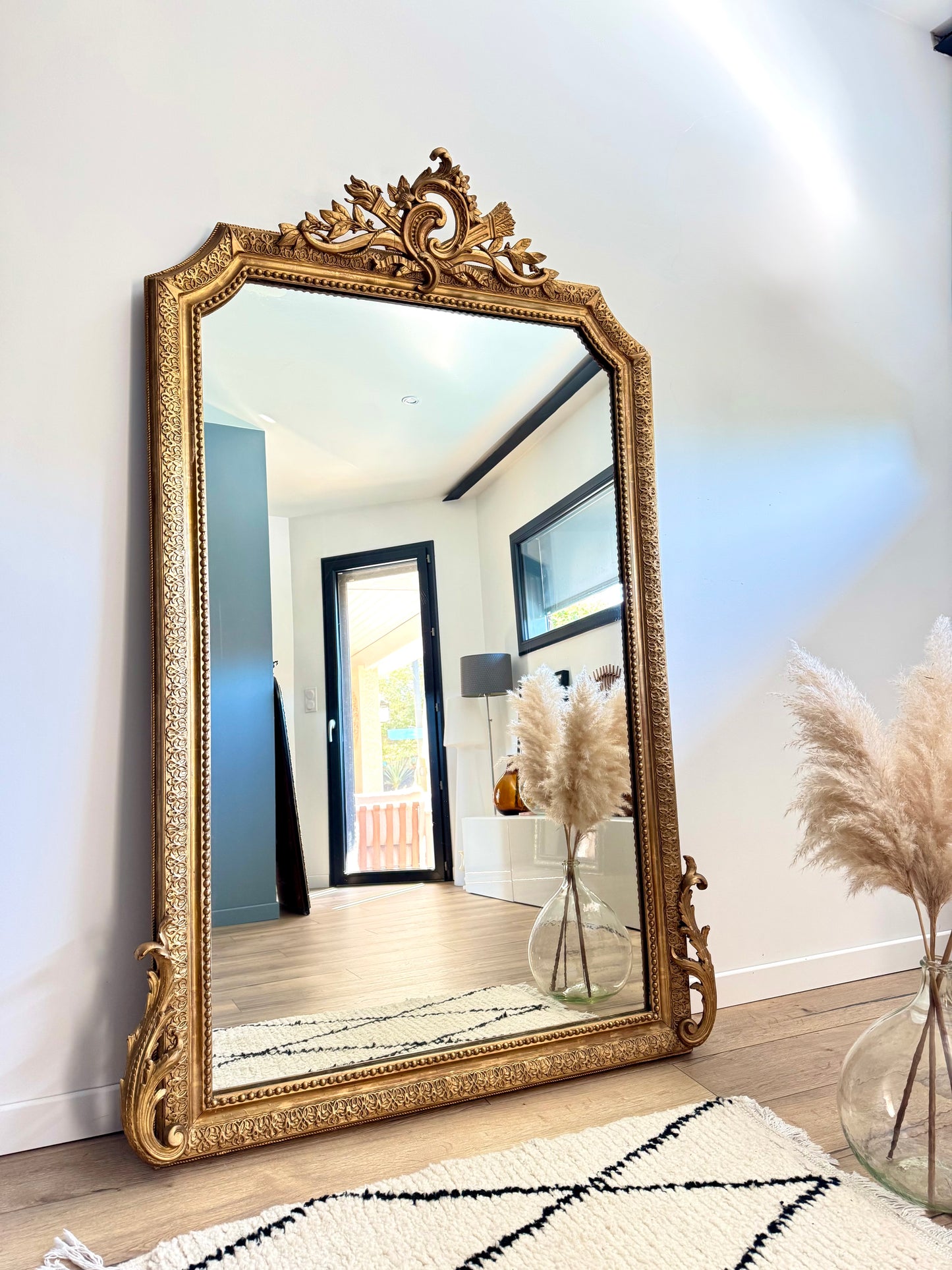 Grand miroir ancien doré à la feuille d'or