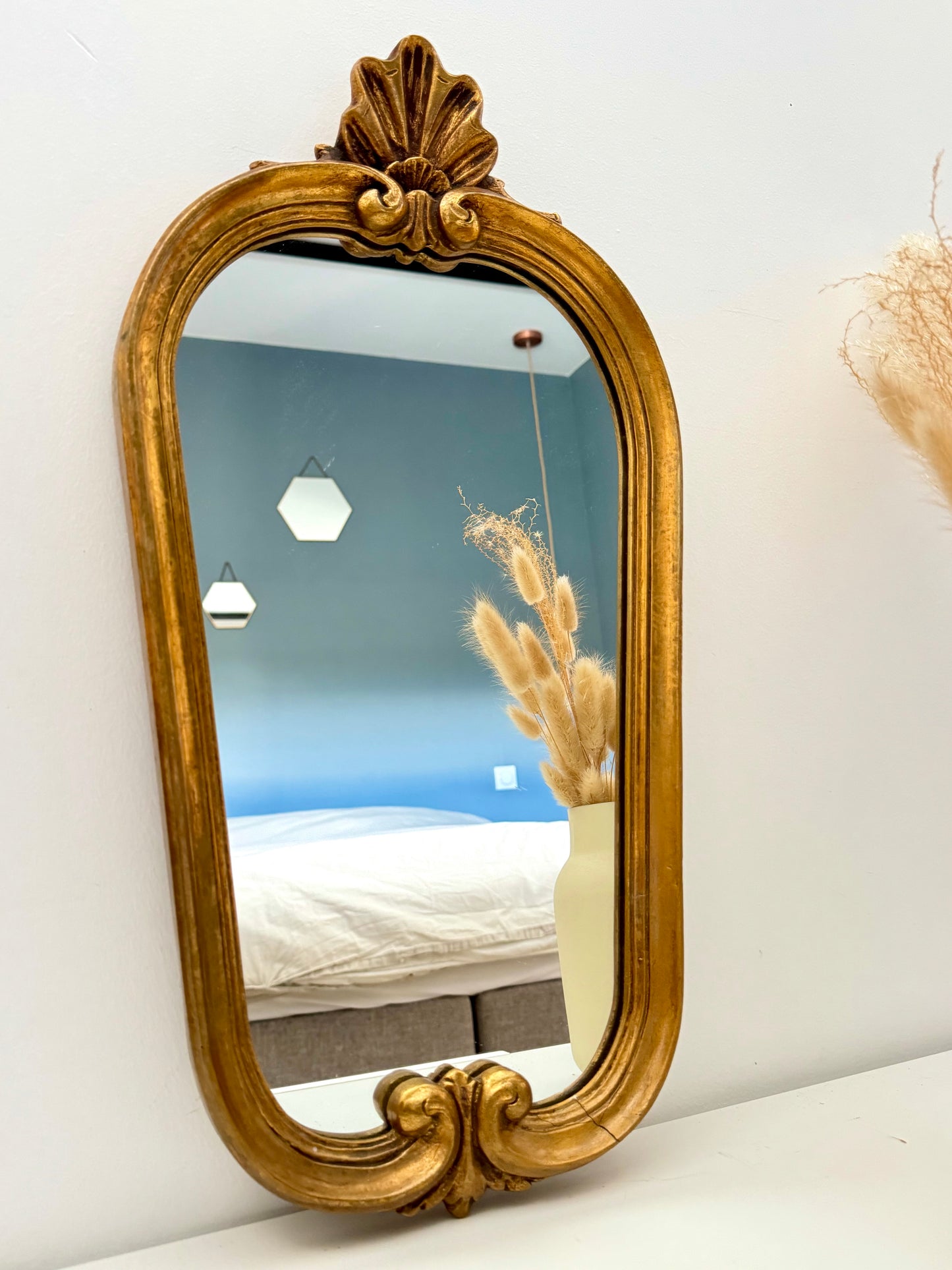 Miroir ancien doré de style baroque