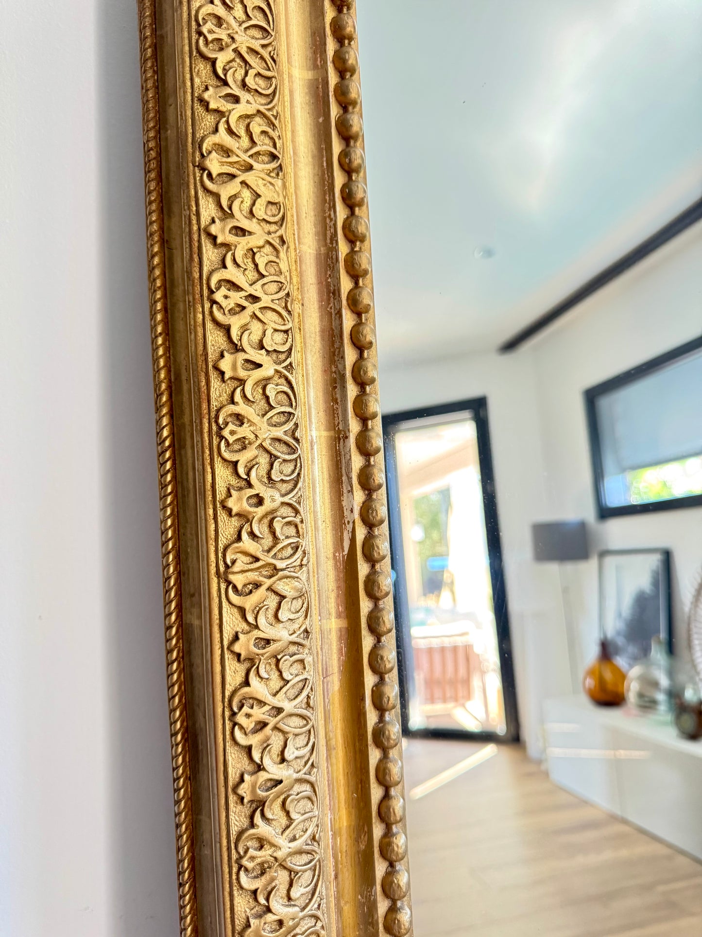 Grand miroir ancien doré à la feuille d'or