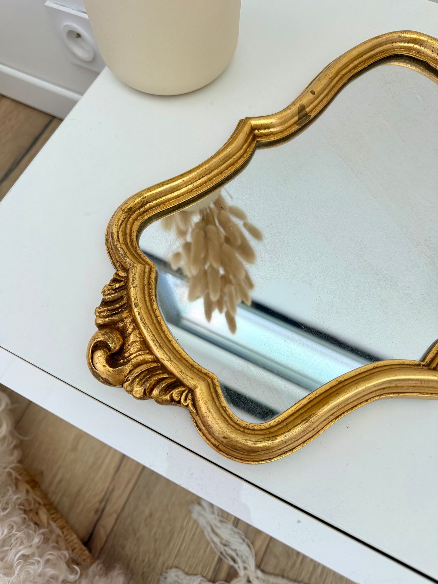 Miroir ancien de style baroque doré