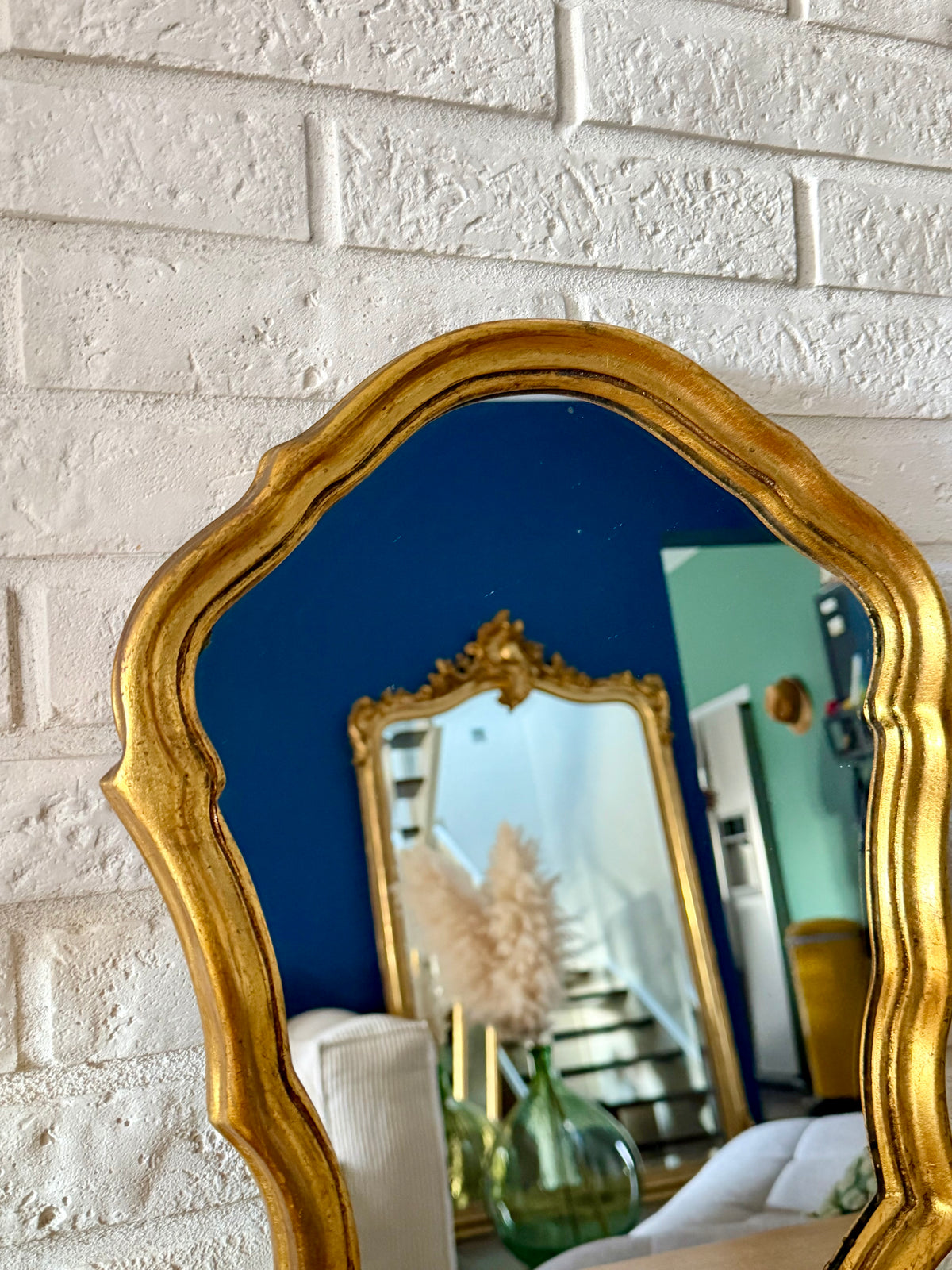 Miroir ancien doré de style baroque