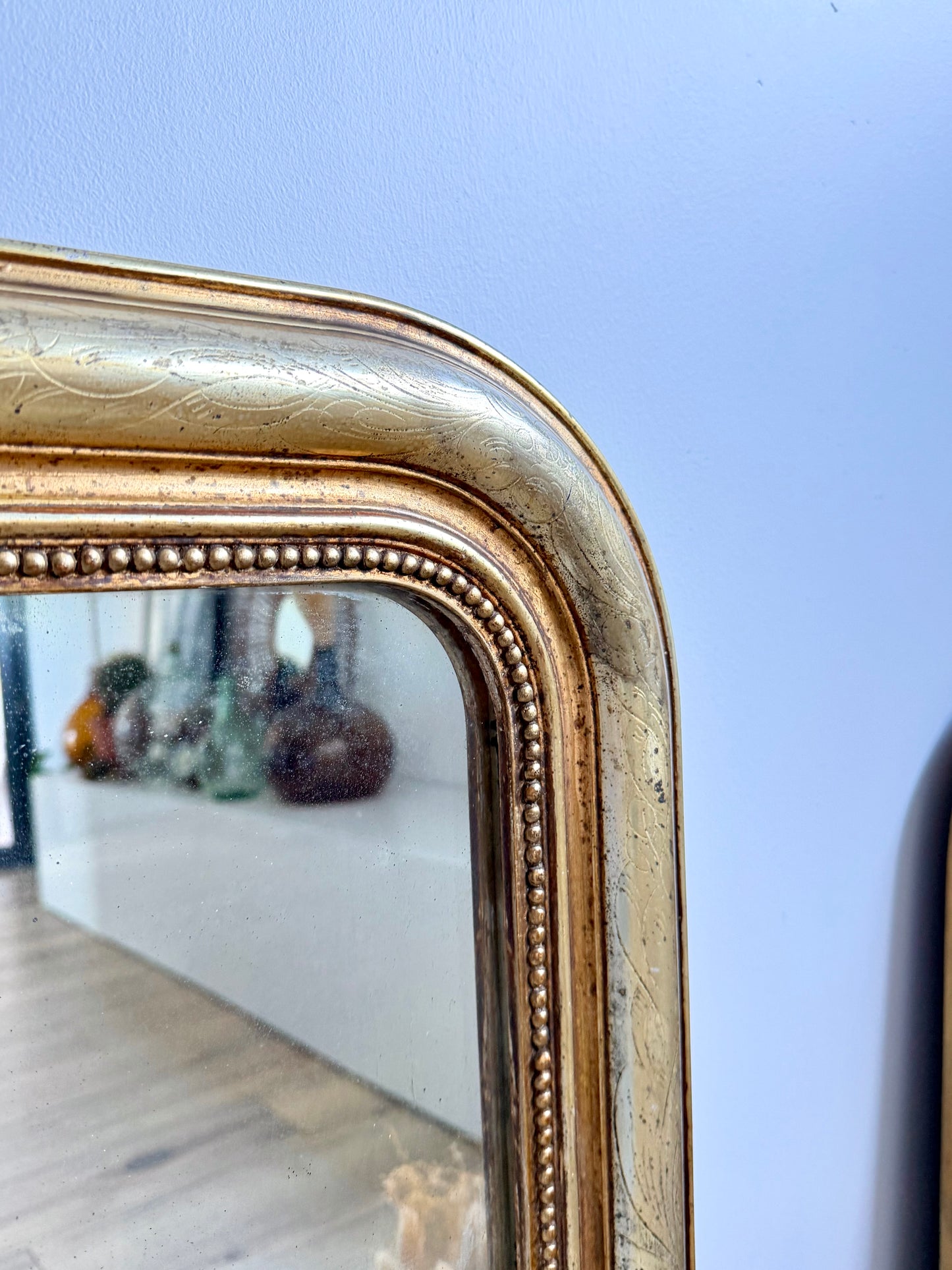 Miroir ancien Louis-Philippe doré à la feuille d’or