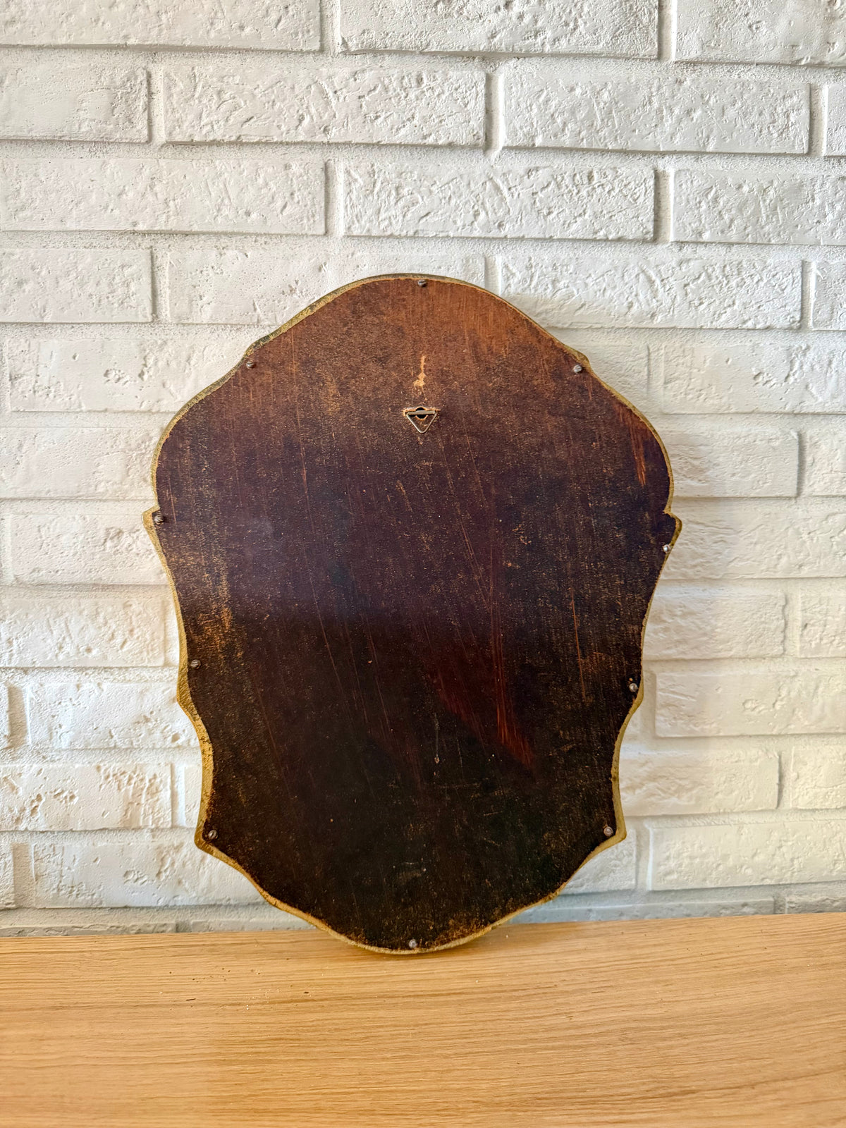 Miroir ancien doré de style baroque