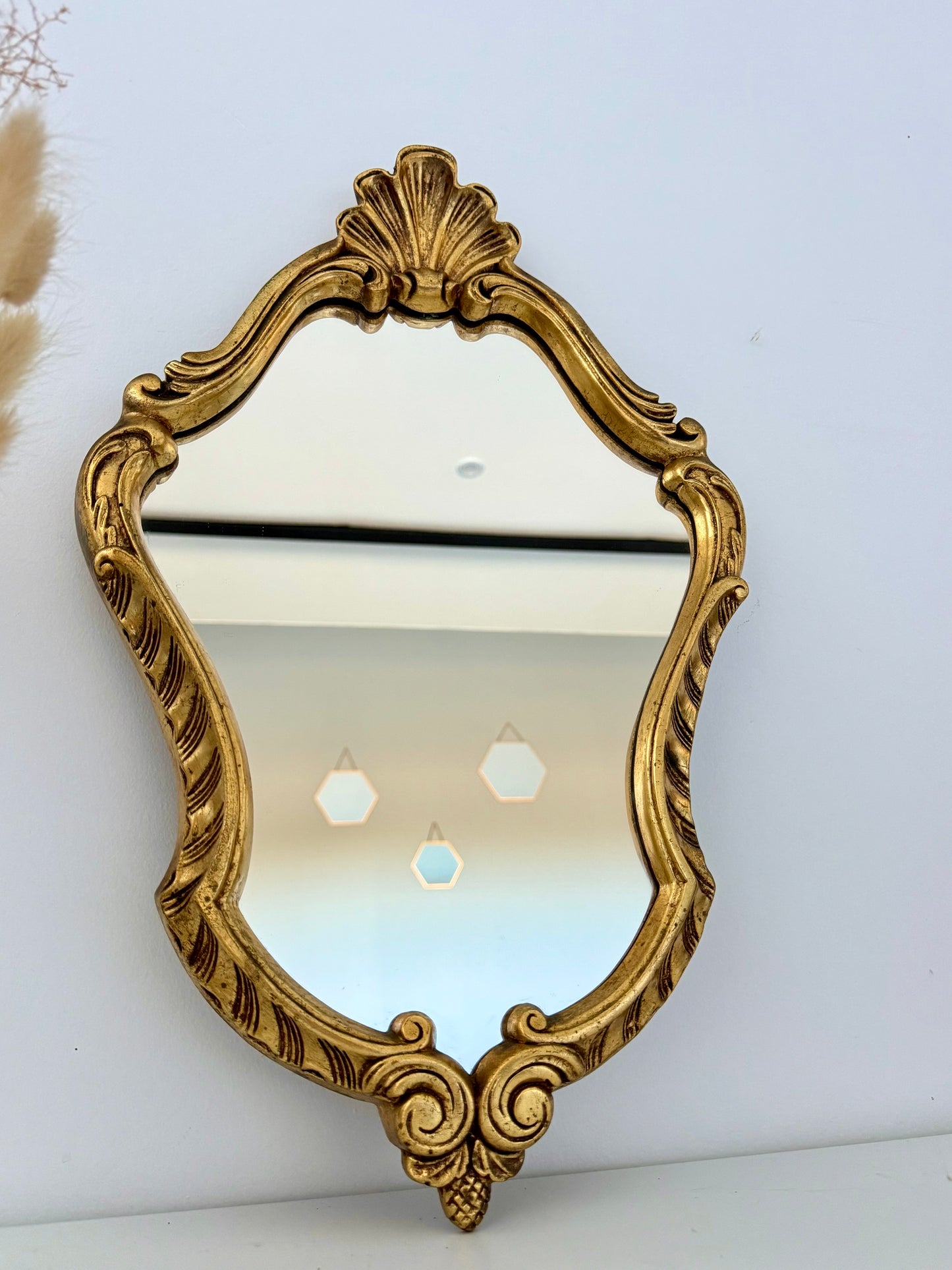 Miroir doré de style baroque
