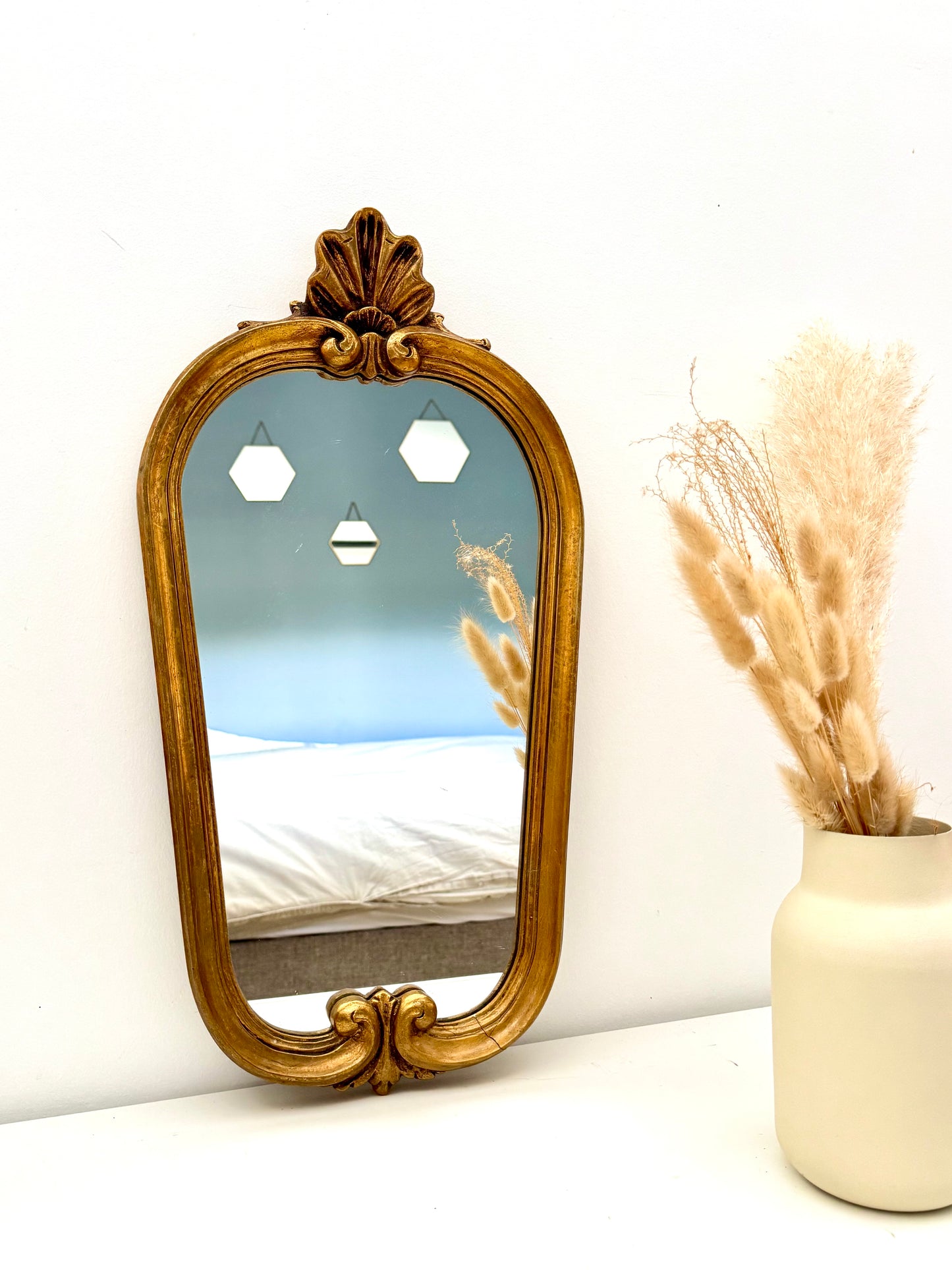 Miroir ancien doré de style baroque