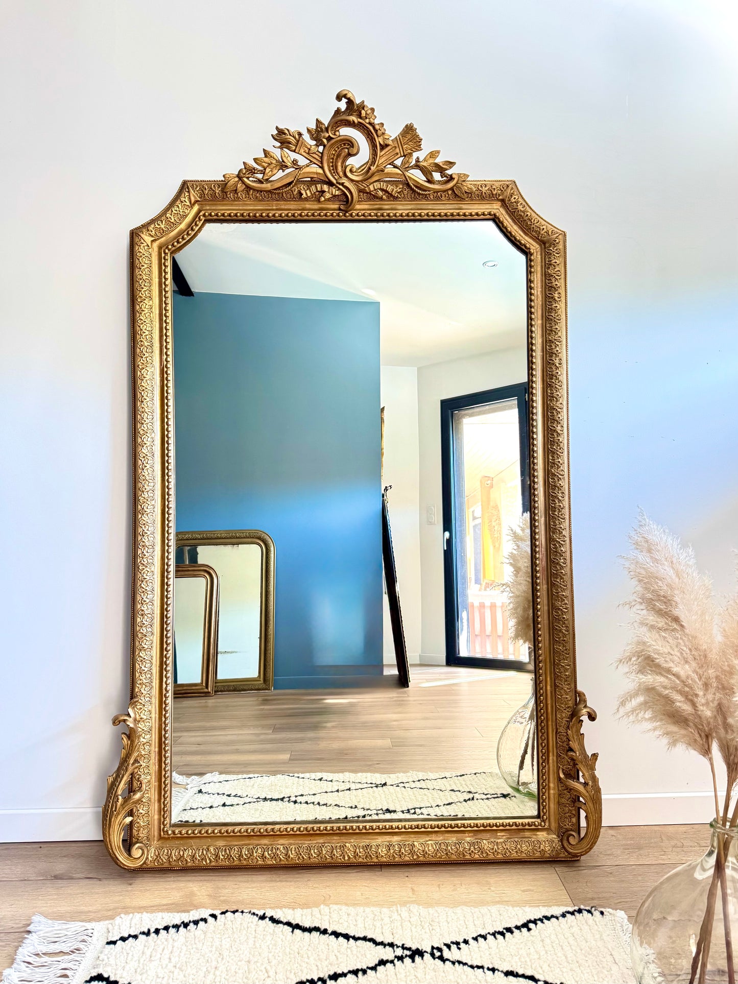 Grand miroir ancien doré à la feuille d'or