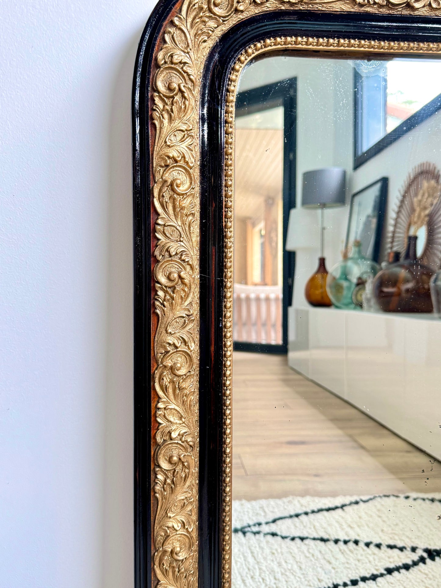 Miroir ancien Louis Philippe noir et doré
