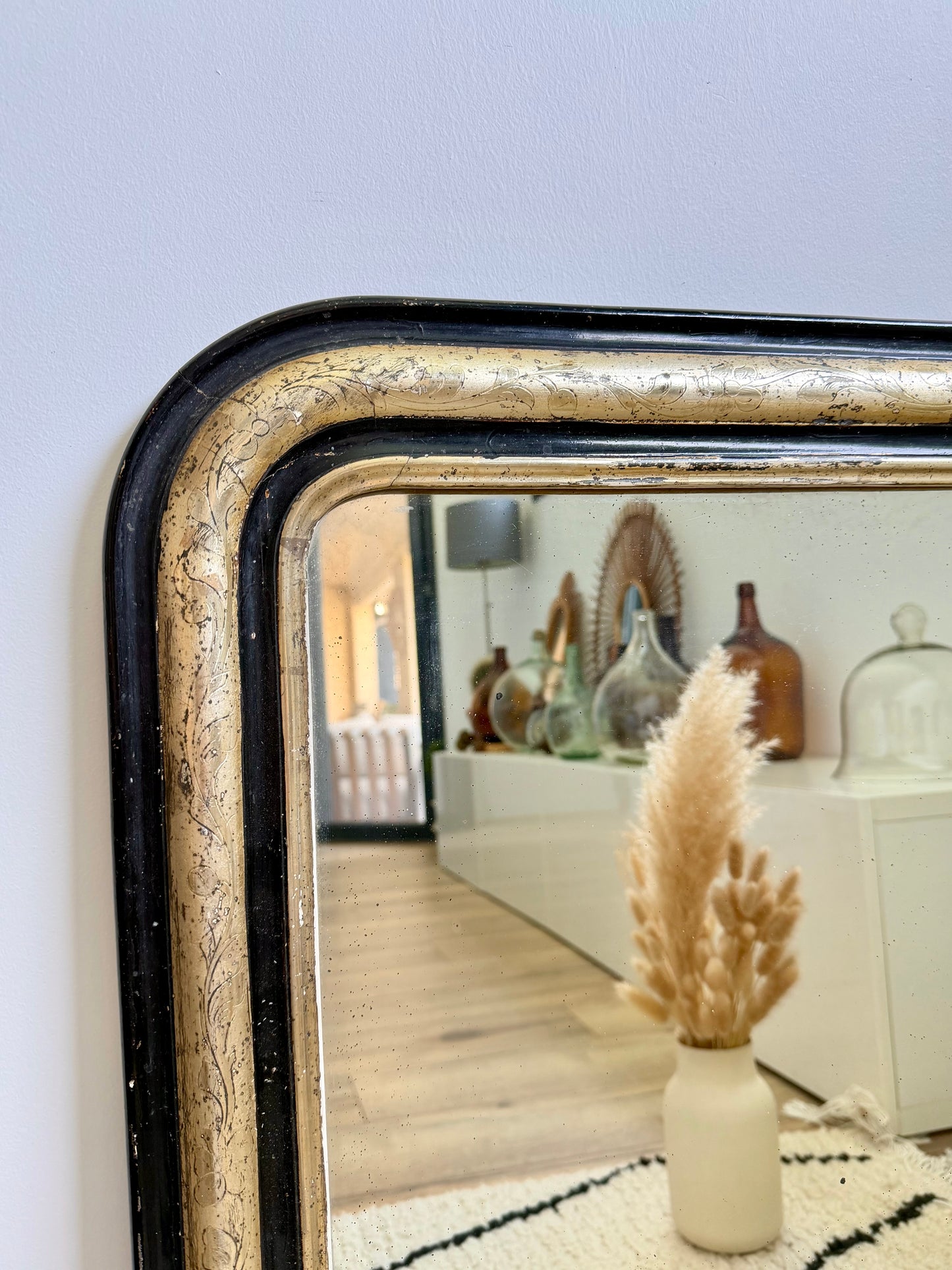 Miroir ancien Louis Philippe doré à la feuille d’or et noir