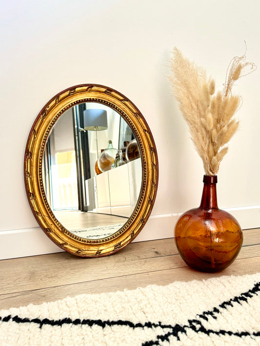 Miroir ancien doré, forme ovale