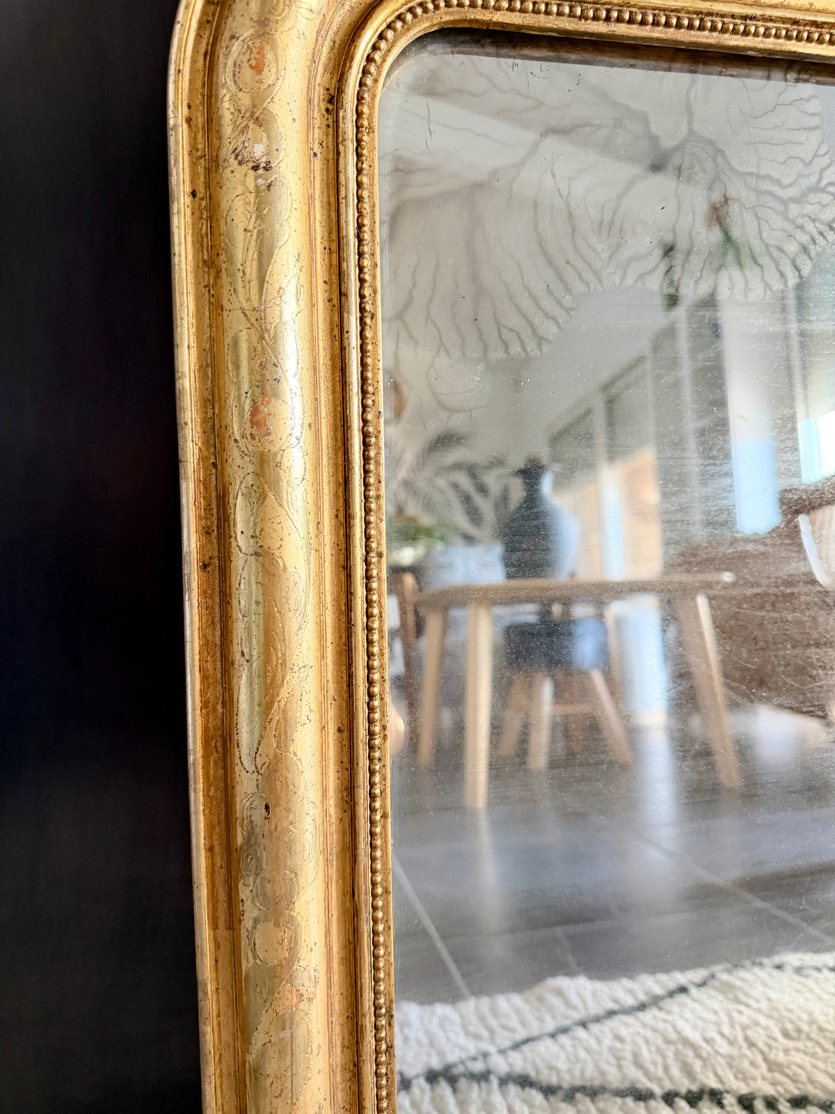 Miroir ancien Louis Philippe doré à la feuille d’or