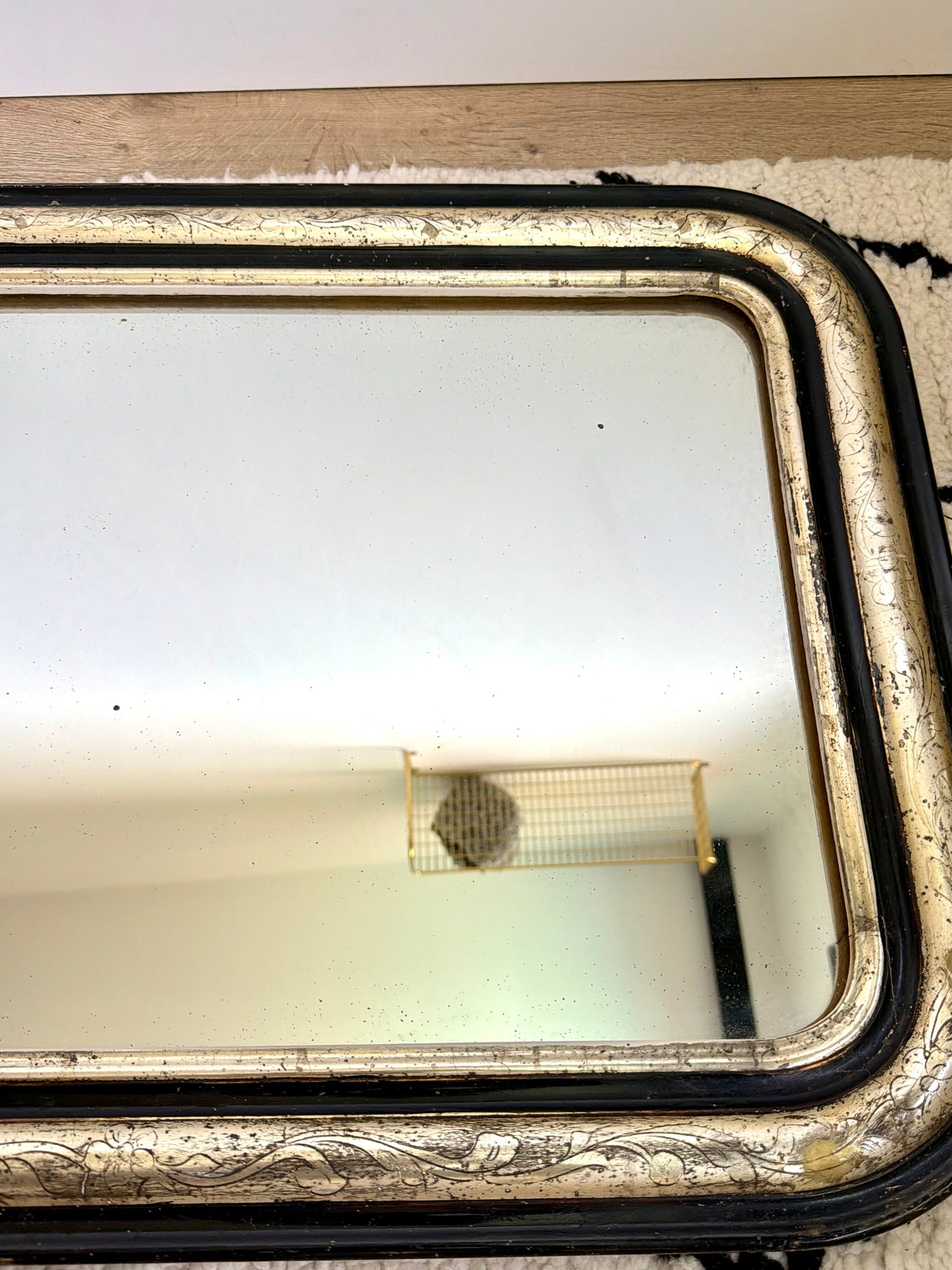 Miroir ancien Louis Philippe doré à la feuille d’or et noir