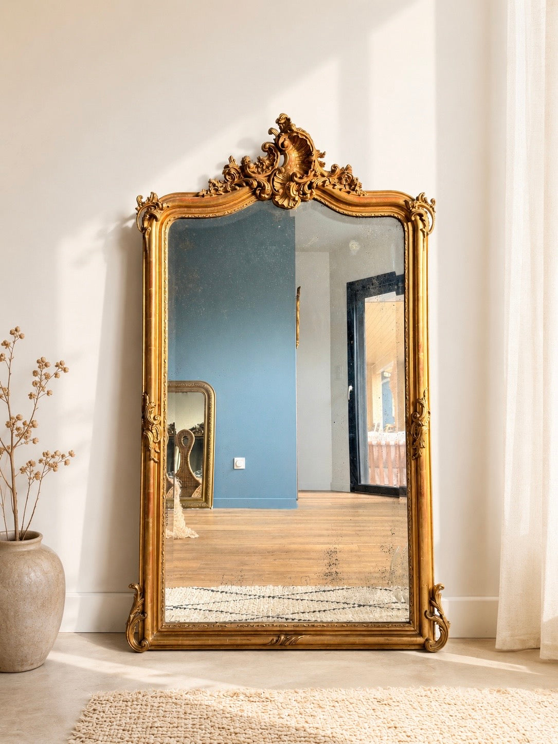 Grand miroir ancien doré au style Louis XV