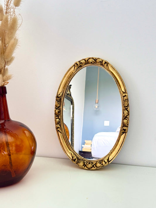 Petit miroir ovale doré