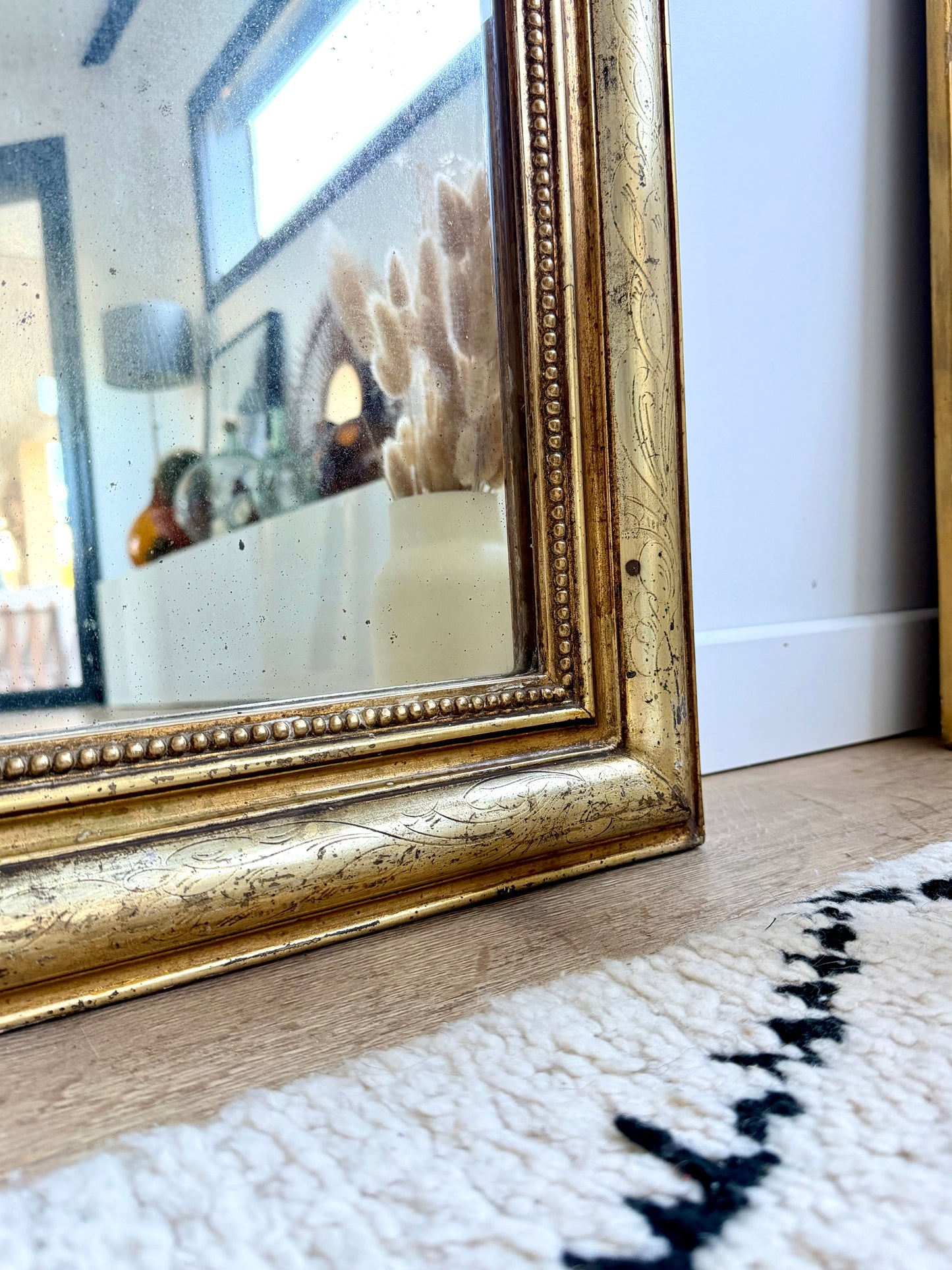 Miroir ancien Louis-Philippe doré à la feuille d’or