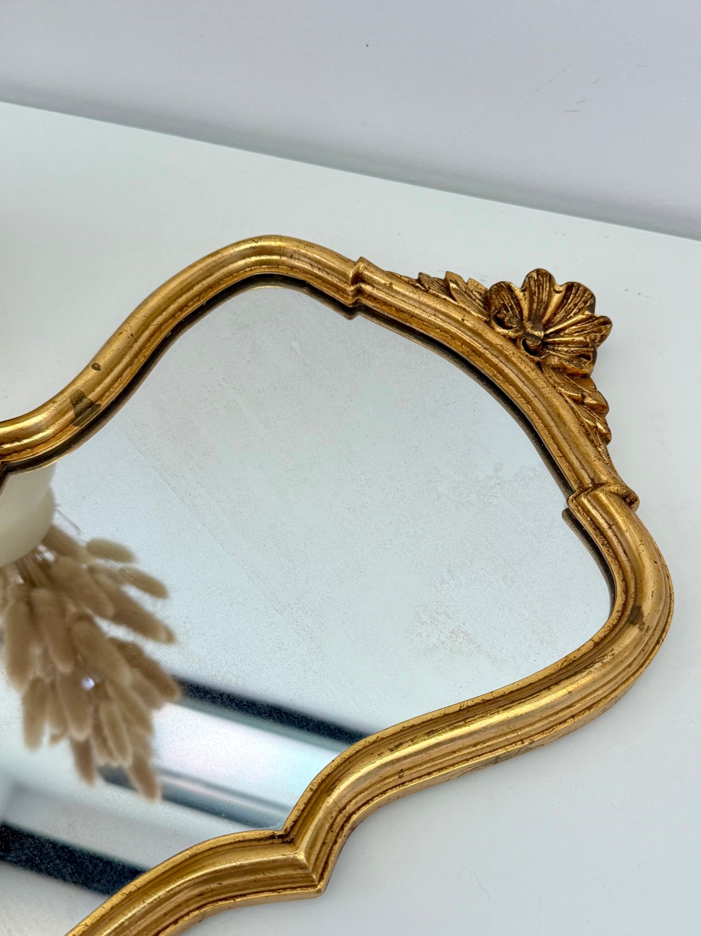 Miroir ancien de style baroque doré