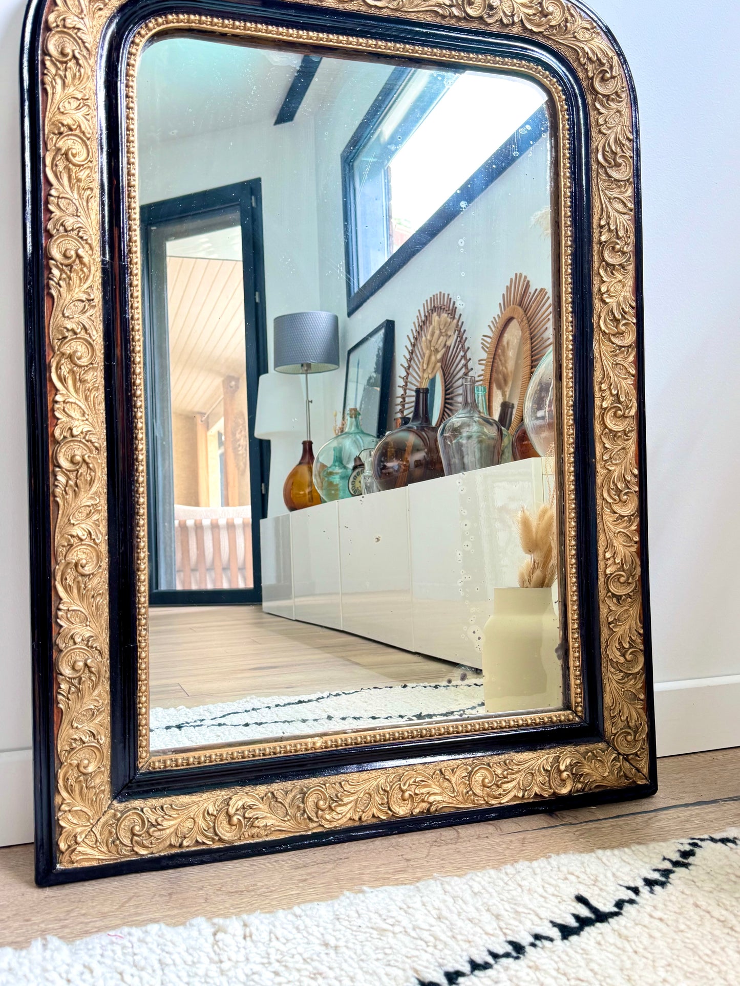 Miroir ancien Louis Philippe noir et doré
