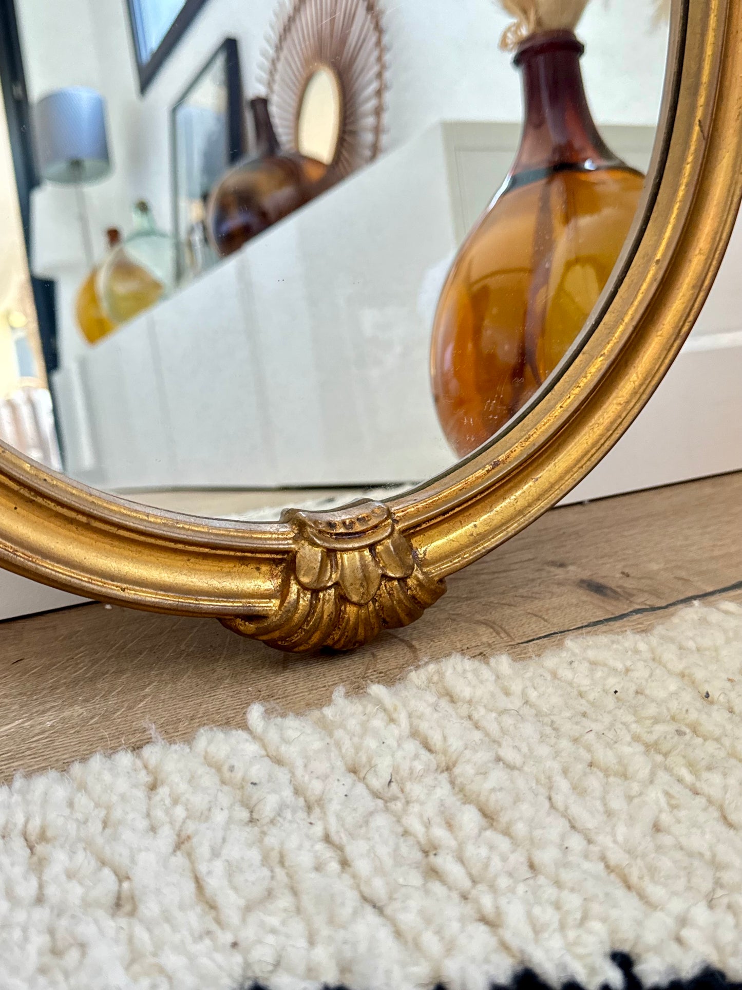 Miroir ovale doré