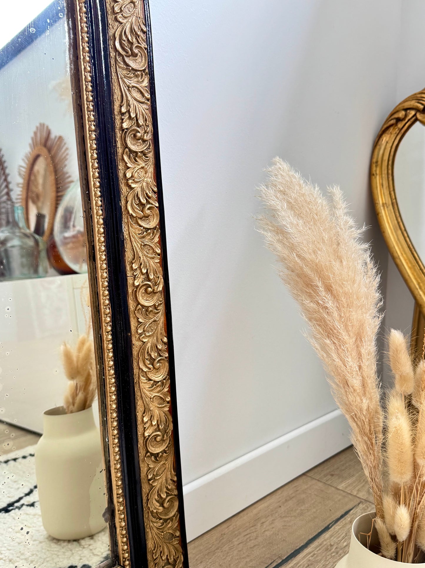 Miroir ancien Louis Philippe noir et doré