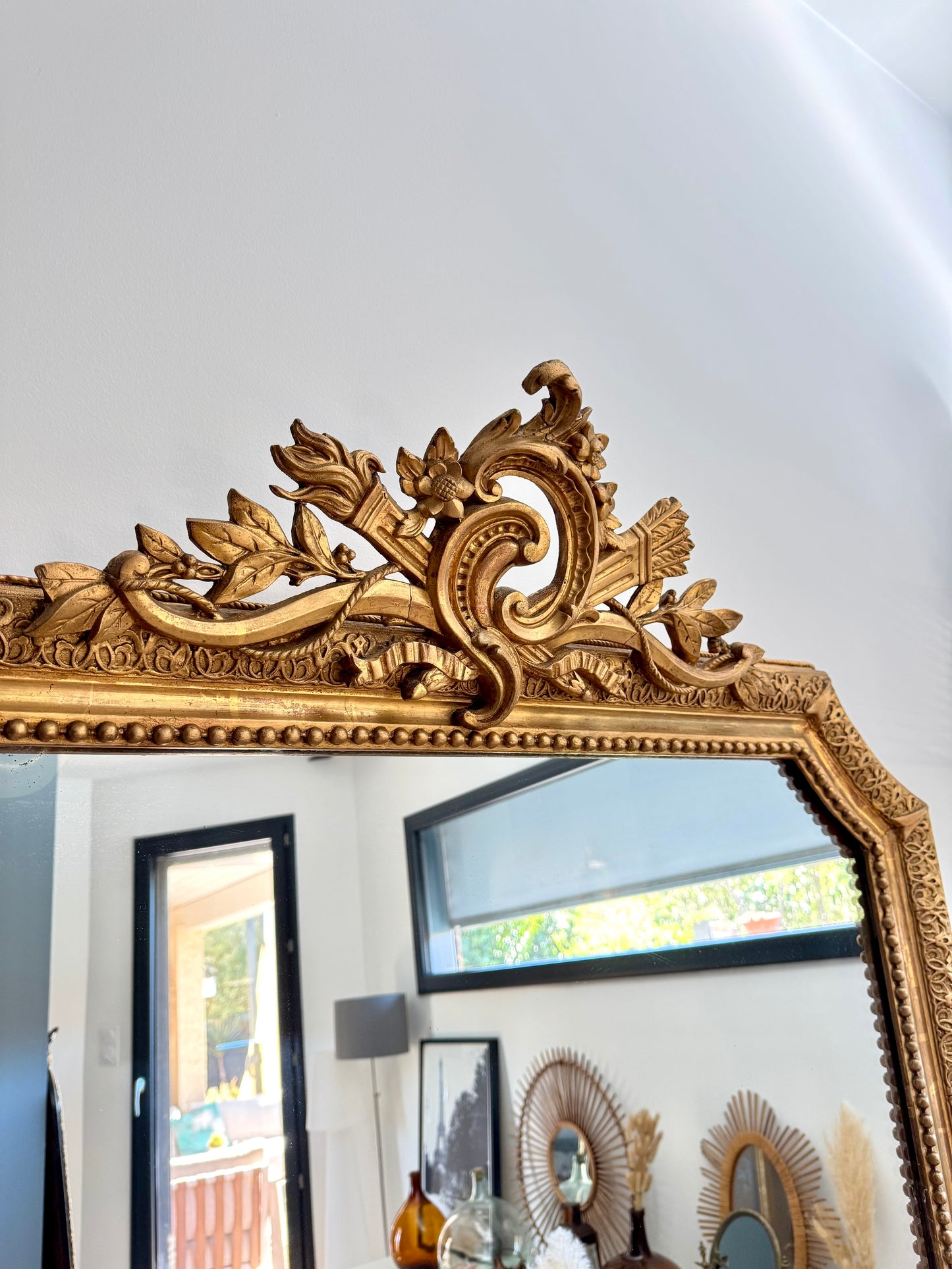 Grand miroir ancien doré à la feuille d'or
