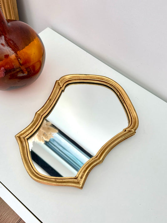 Petit miroir doré de style baroque