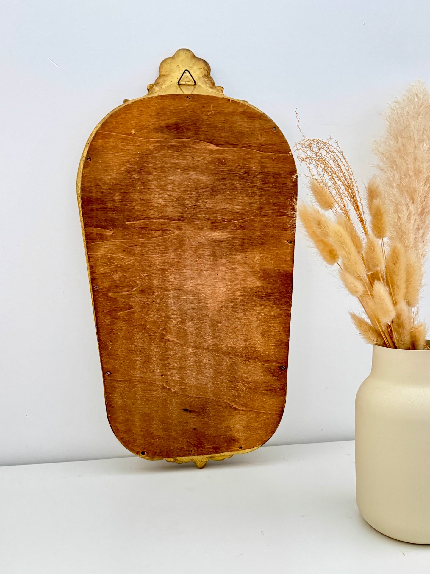 Miroir ancien doré de style baroque