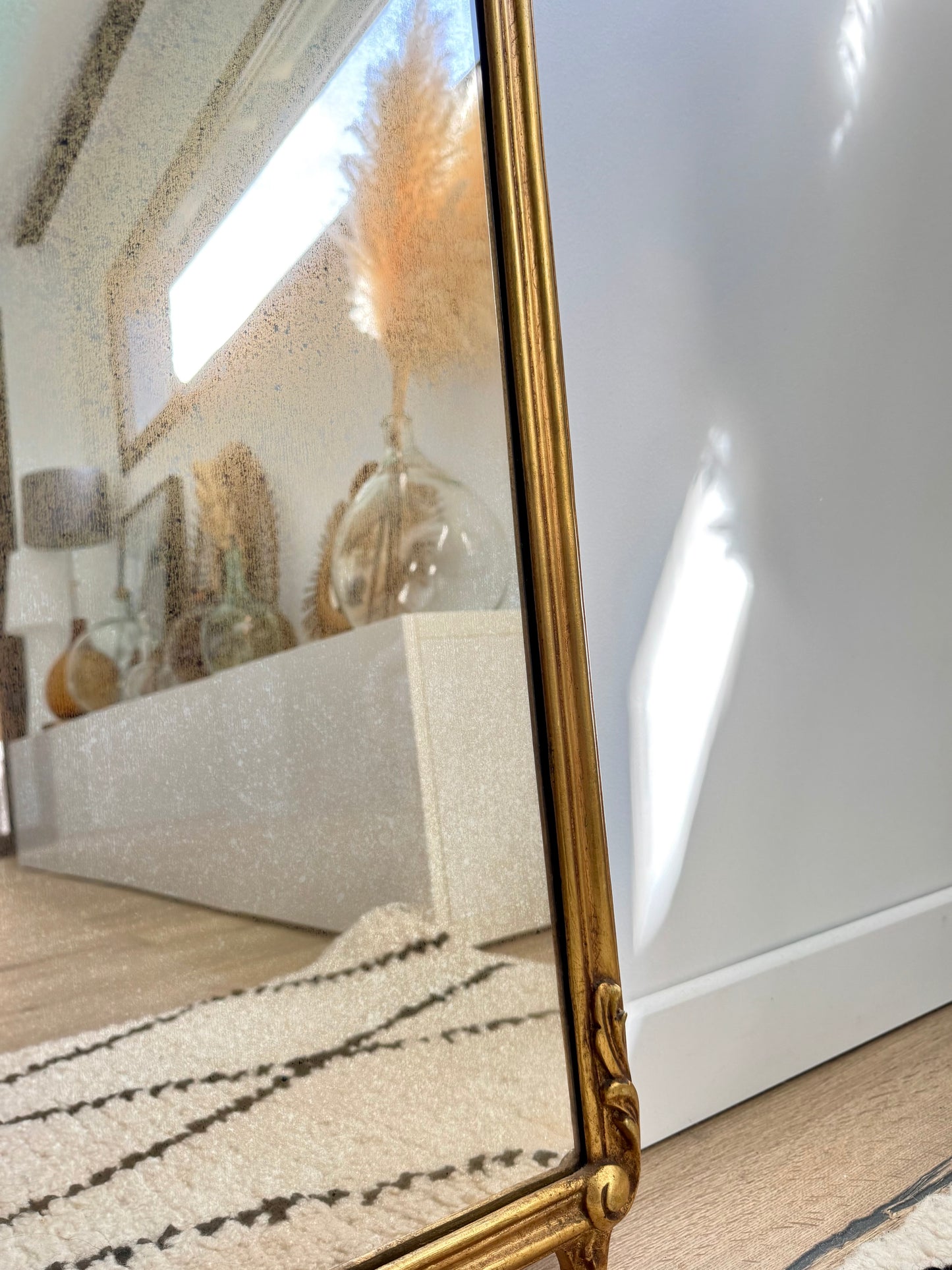 Miroir ancien doré style baroque