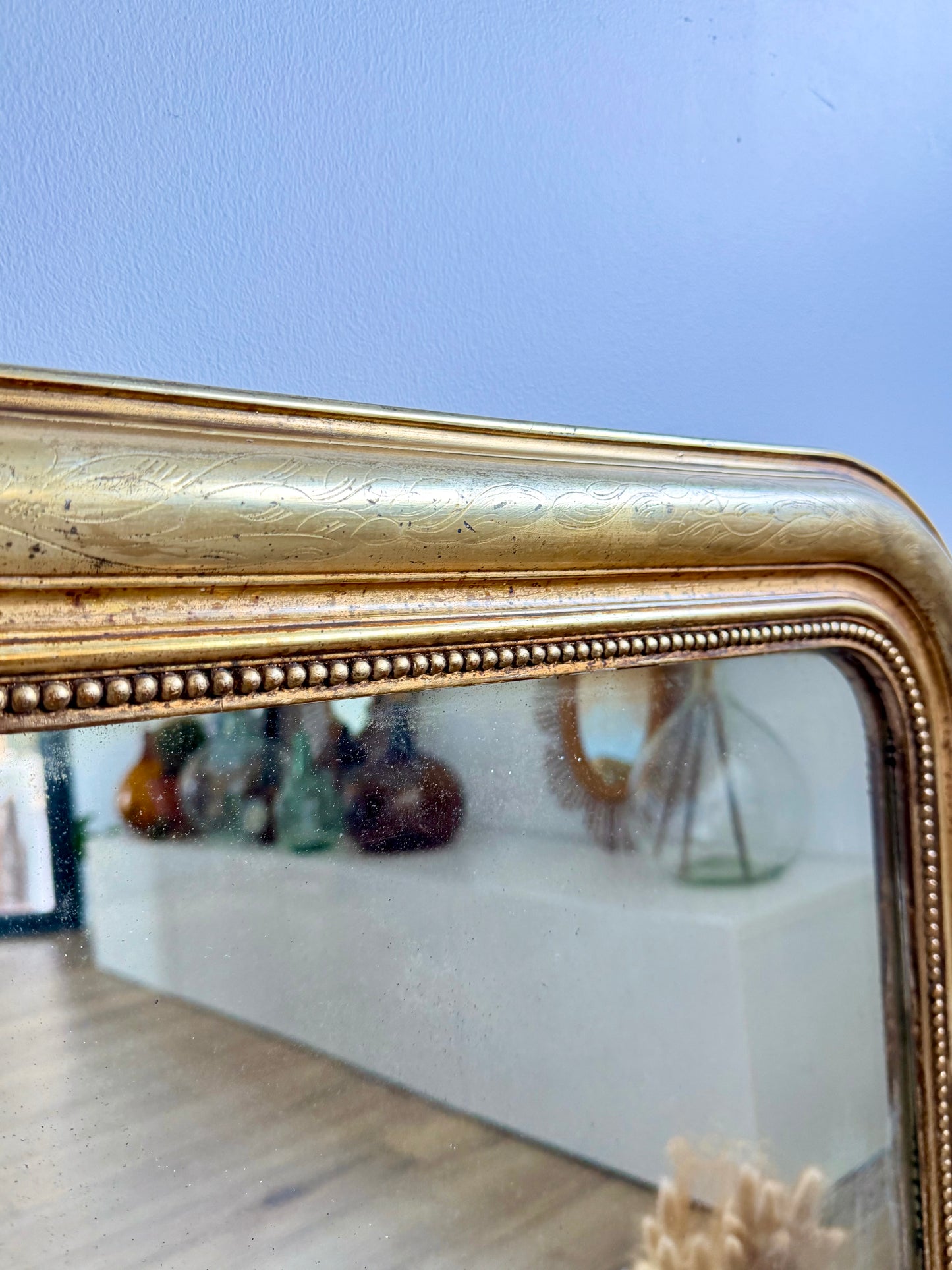 Miroir ancien Louis-Philippe doré à la feuille d’or
