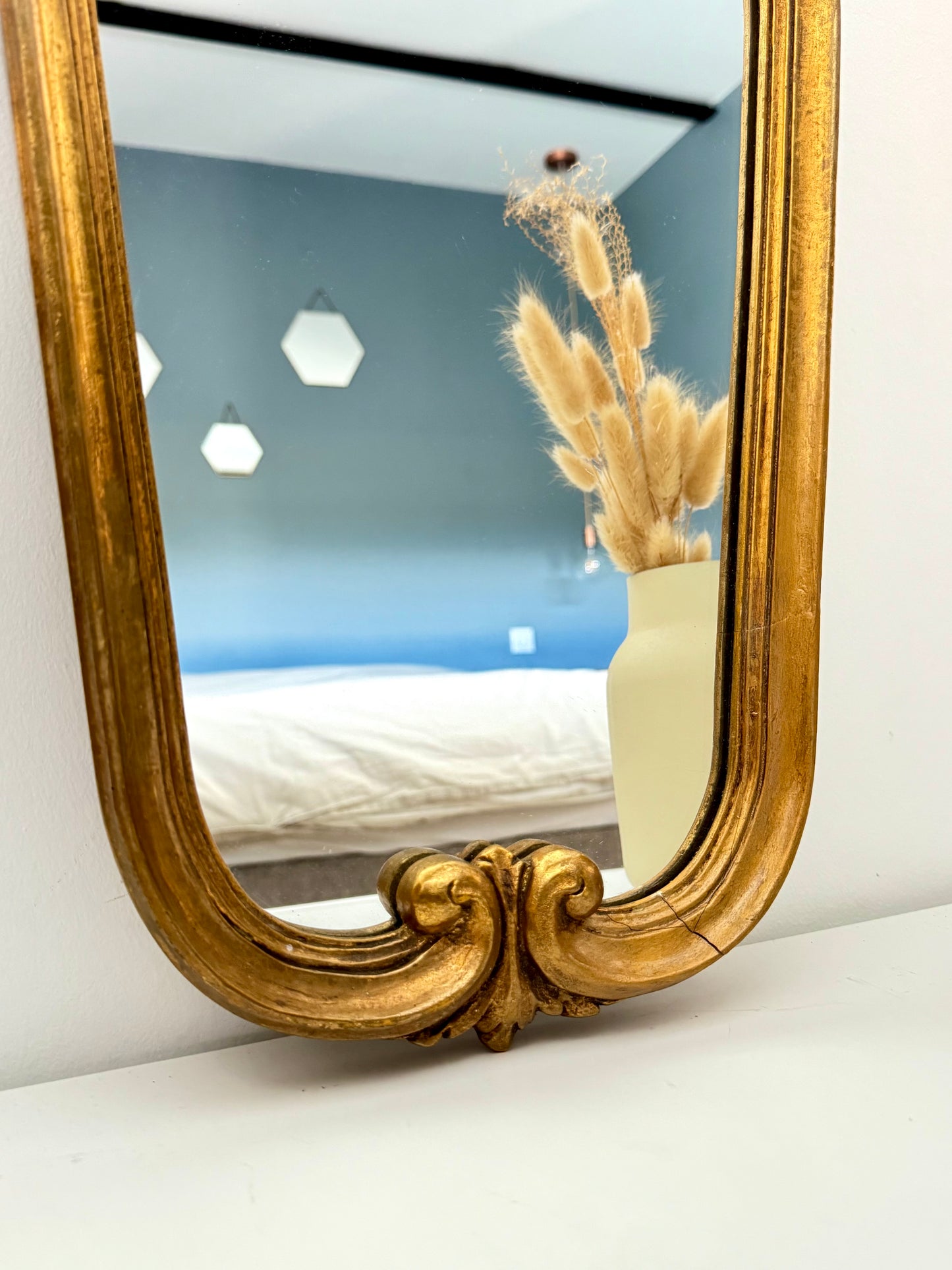 Miroir ancien doré de style baroque