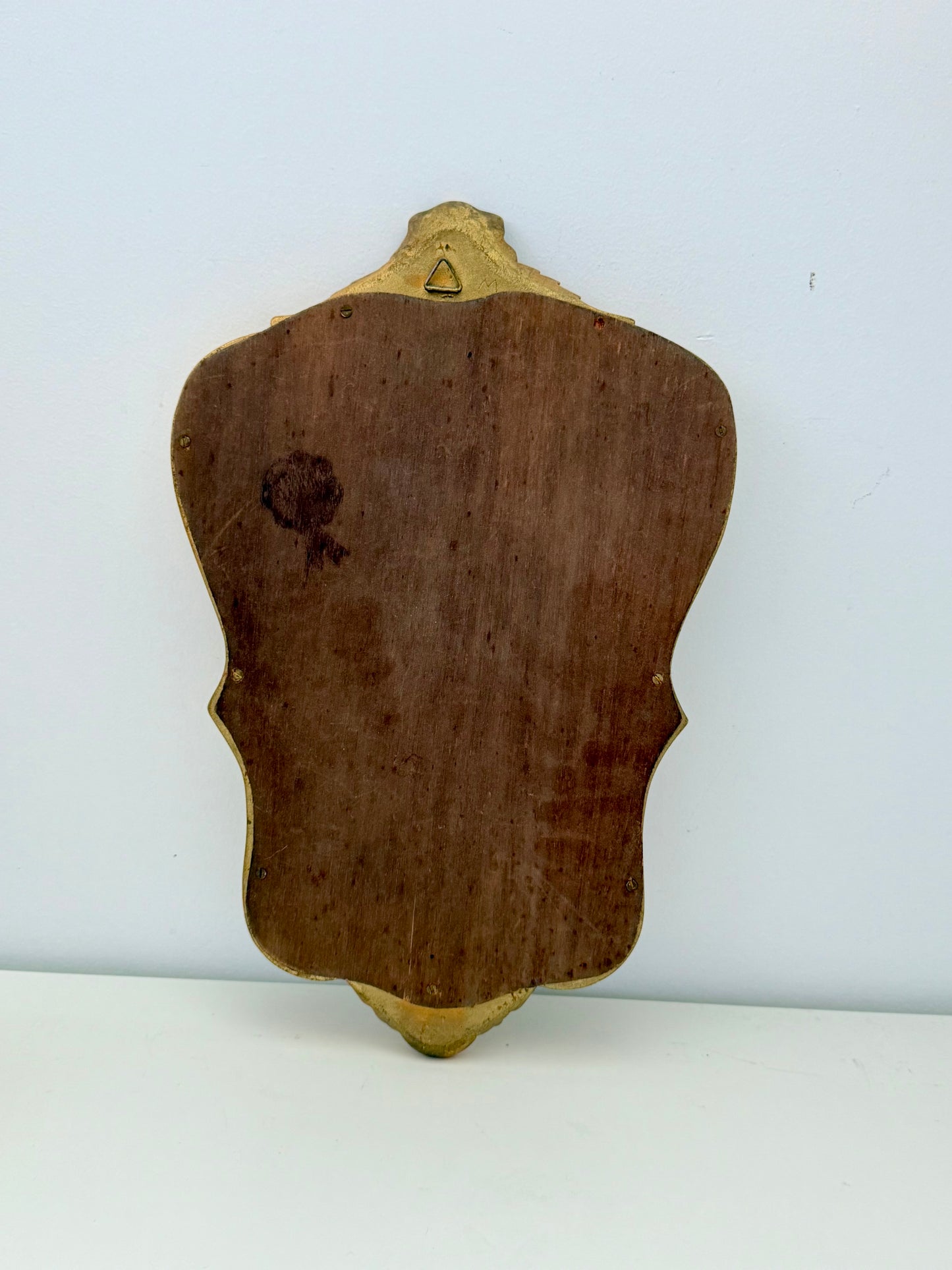 Miroir ancien de style baroque doré
