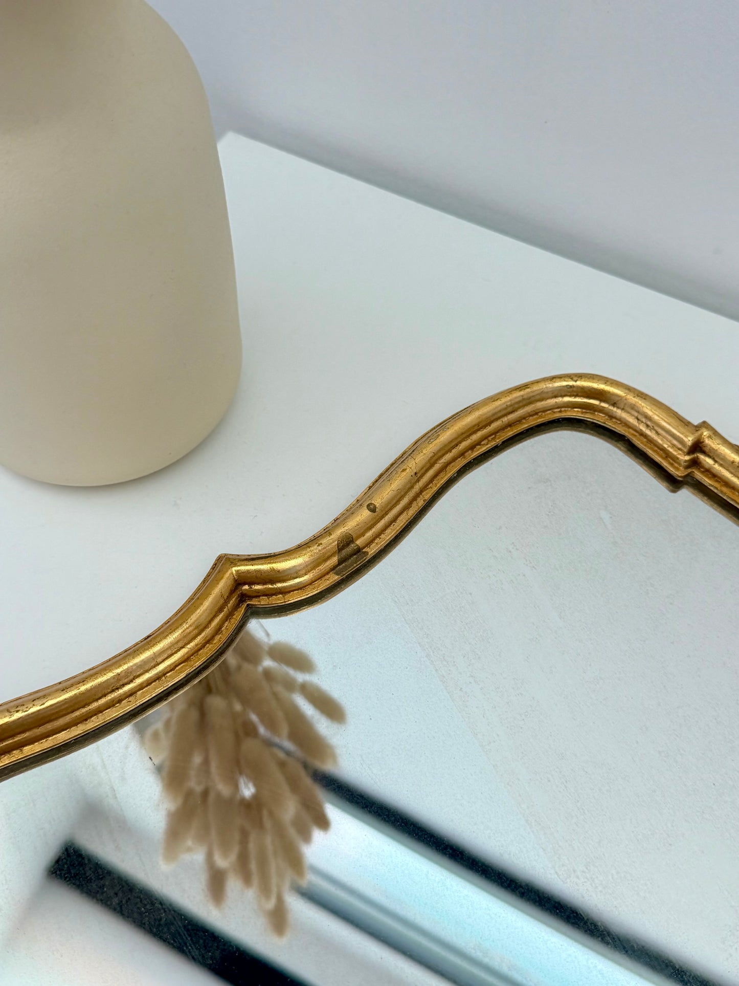 Miroir ancien de style baroque doré