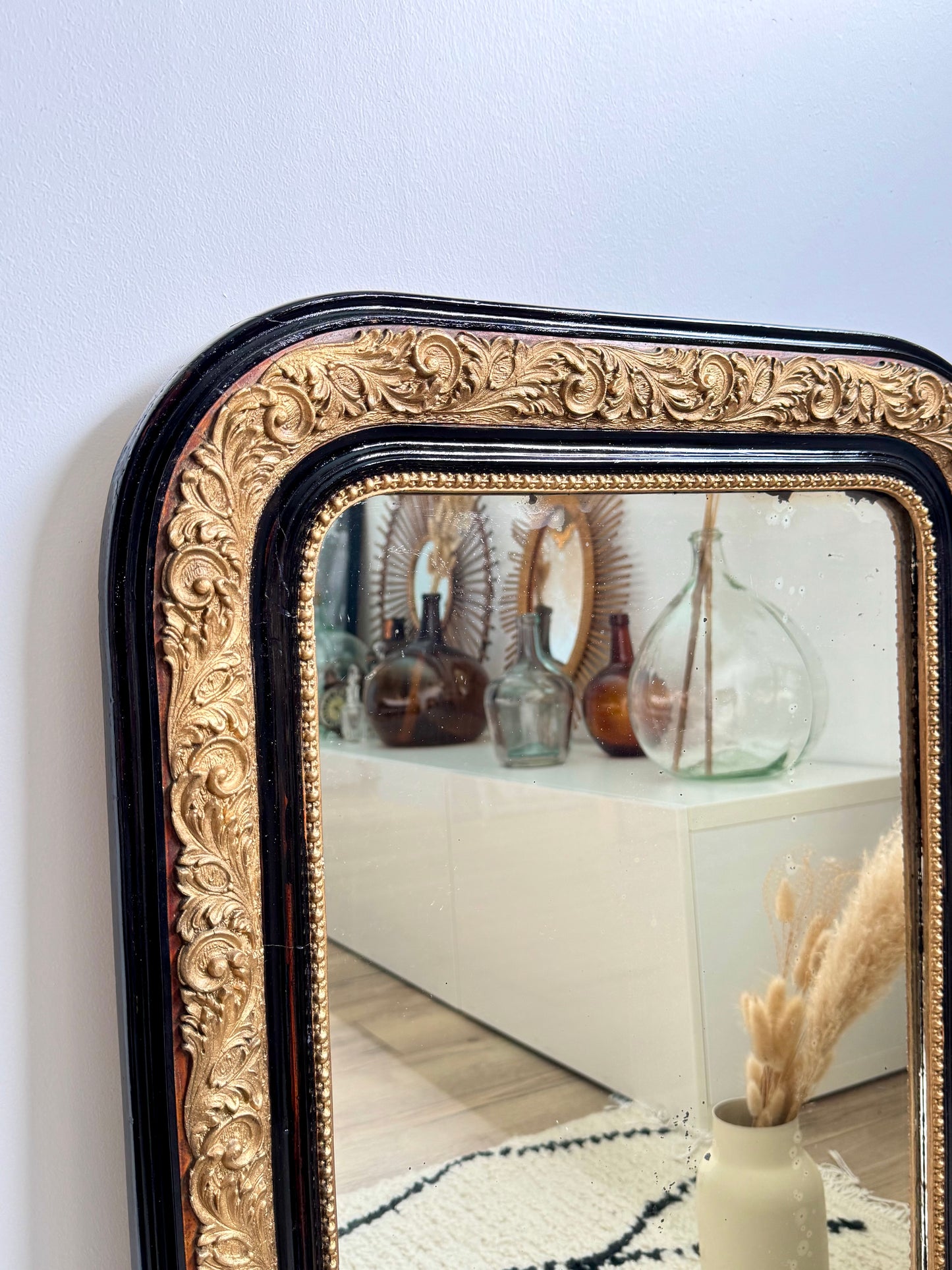 Miroir ancien Louis Philippe noir et doré