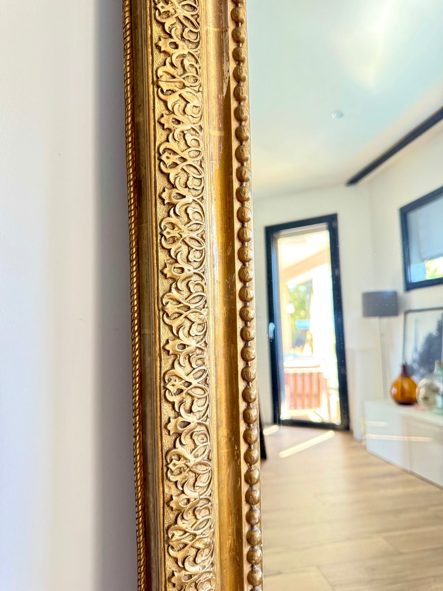 Grand miroir ancien doré à la feuille d'or
