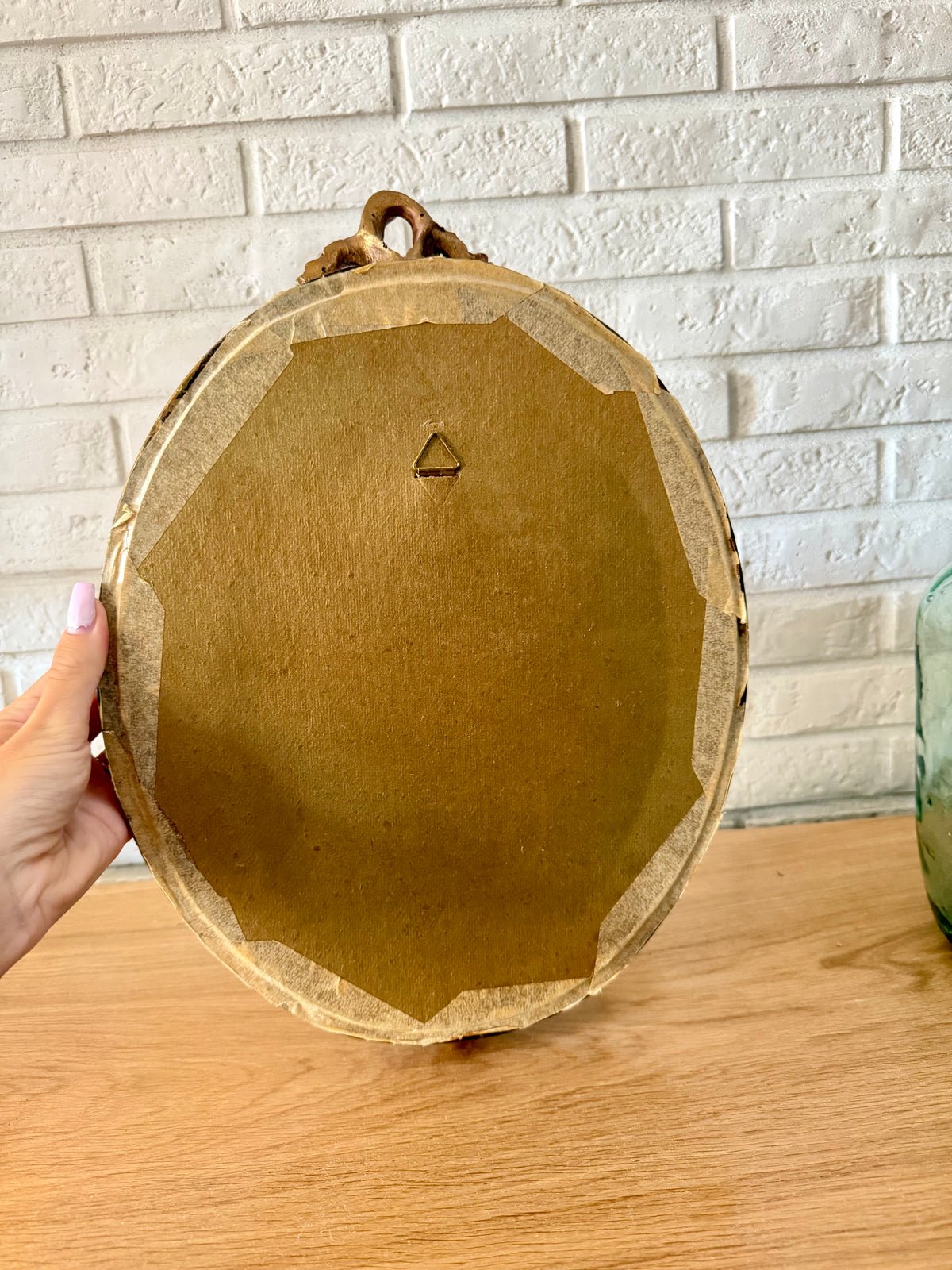 Miroir ancien doré à fronton