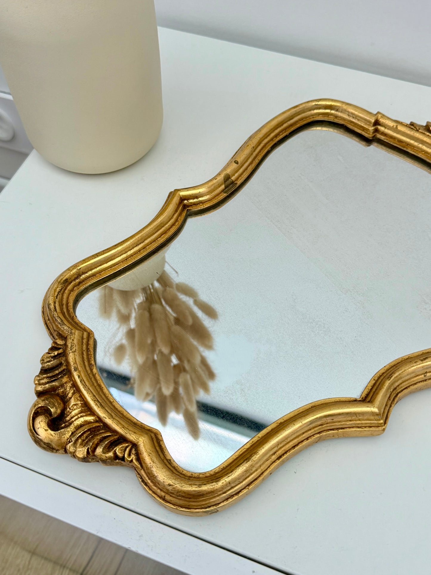 Miroir ancien de style baroque doré