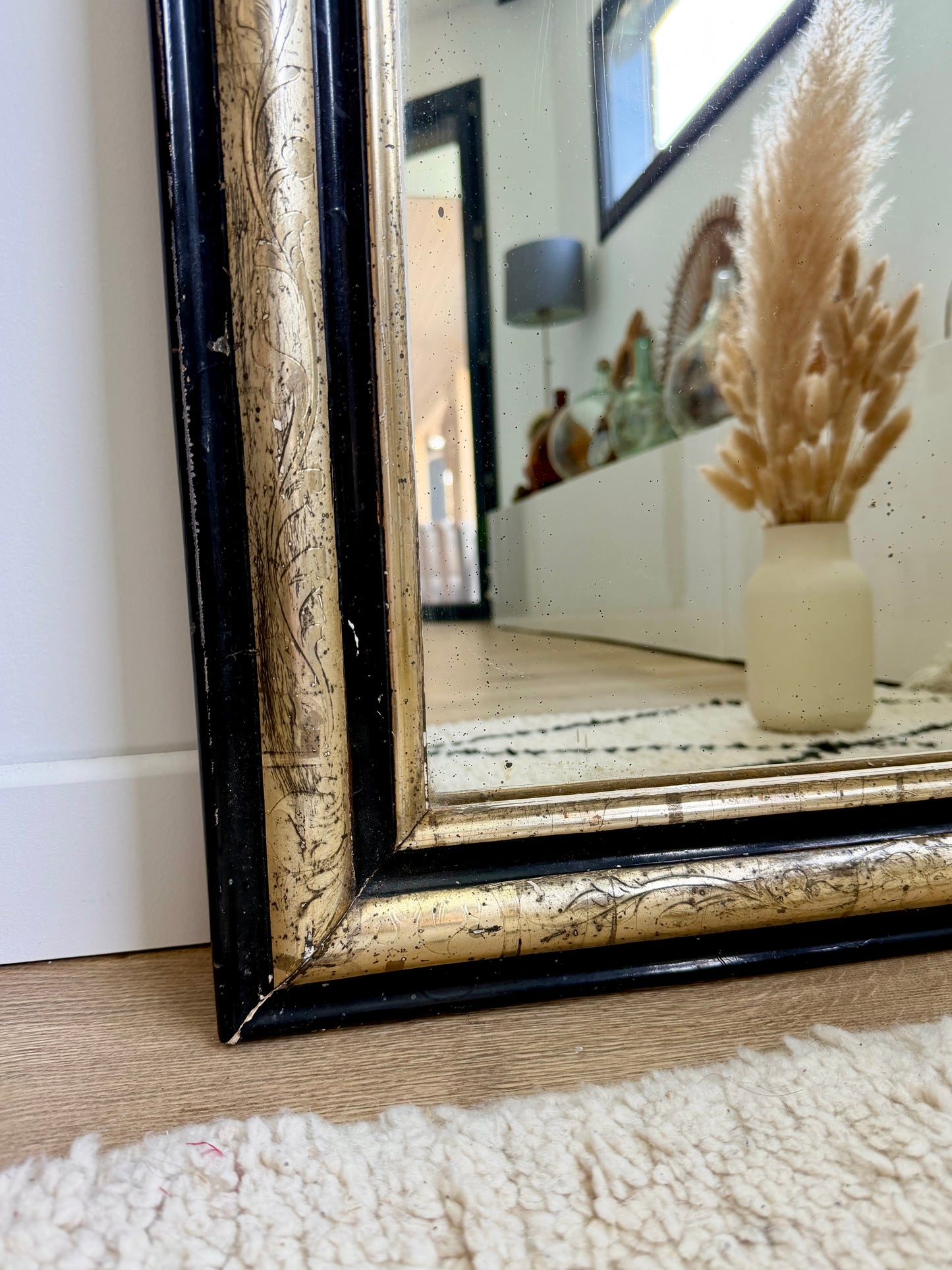 Miroir ancien Louis Philippe doré à la feuille d’or et noir
