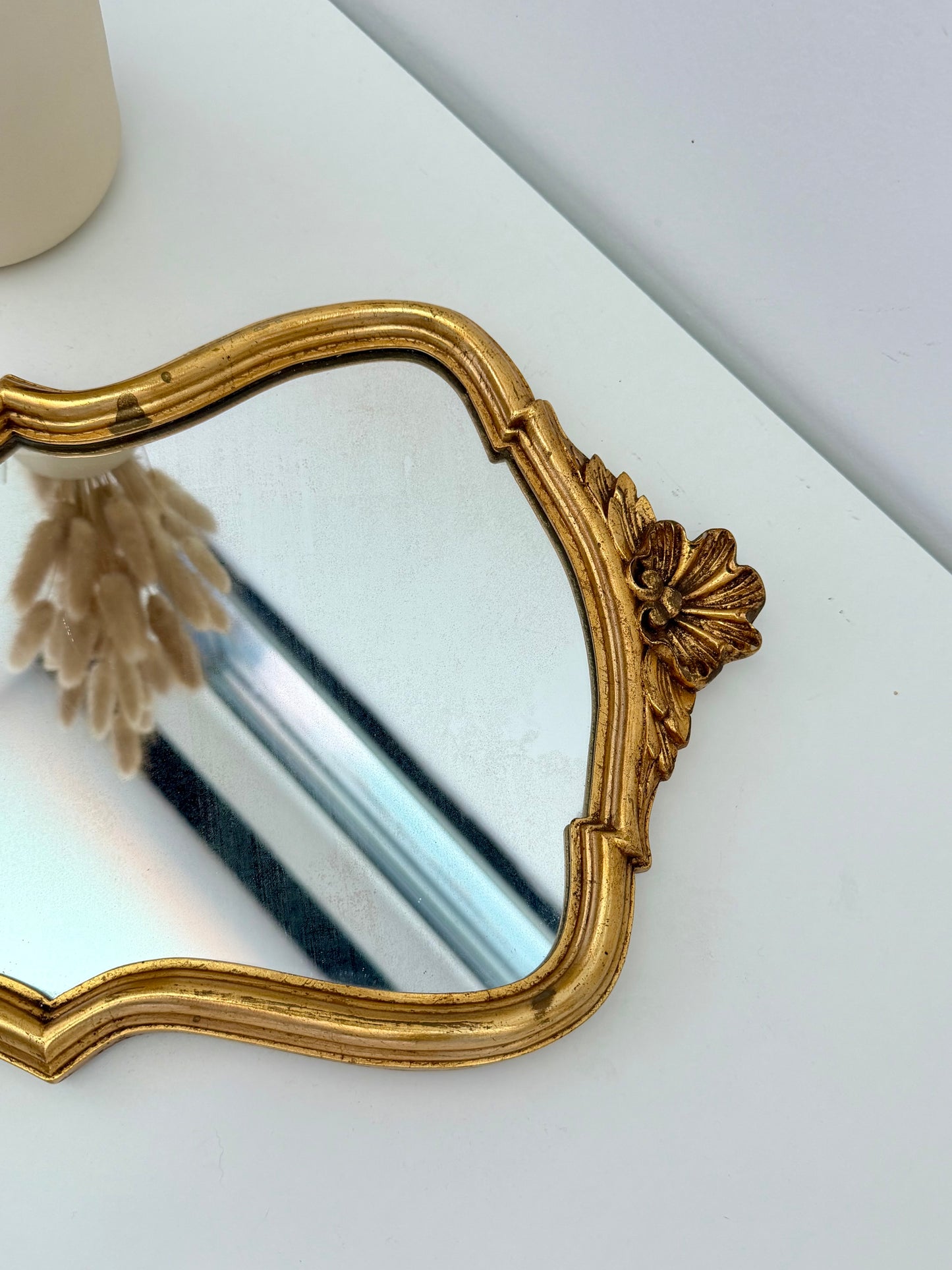 Miroir ancien de style baroque doré