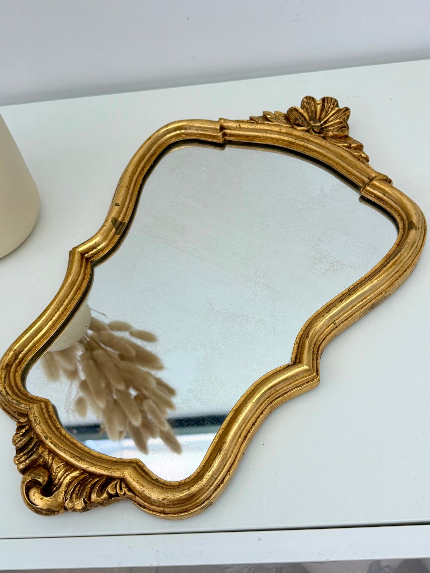 Miroir ancien de style baroque doré
