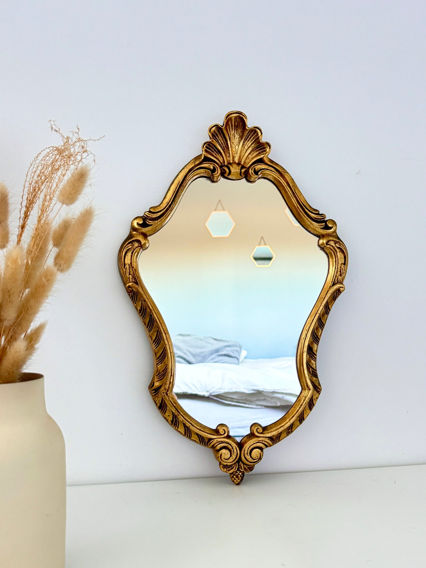 Miroir doré de style baroque