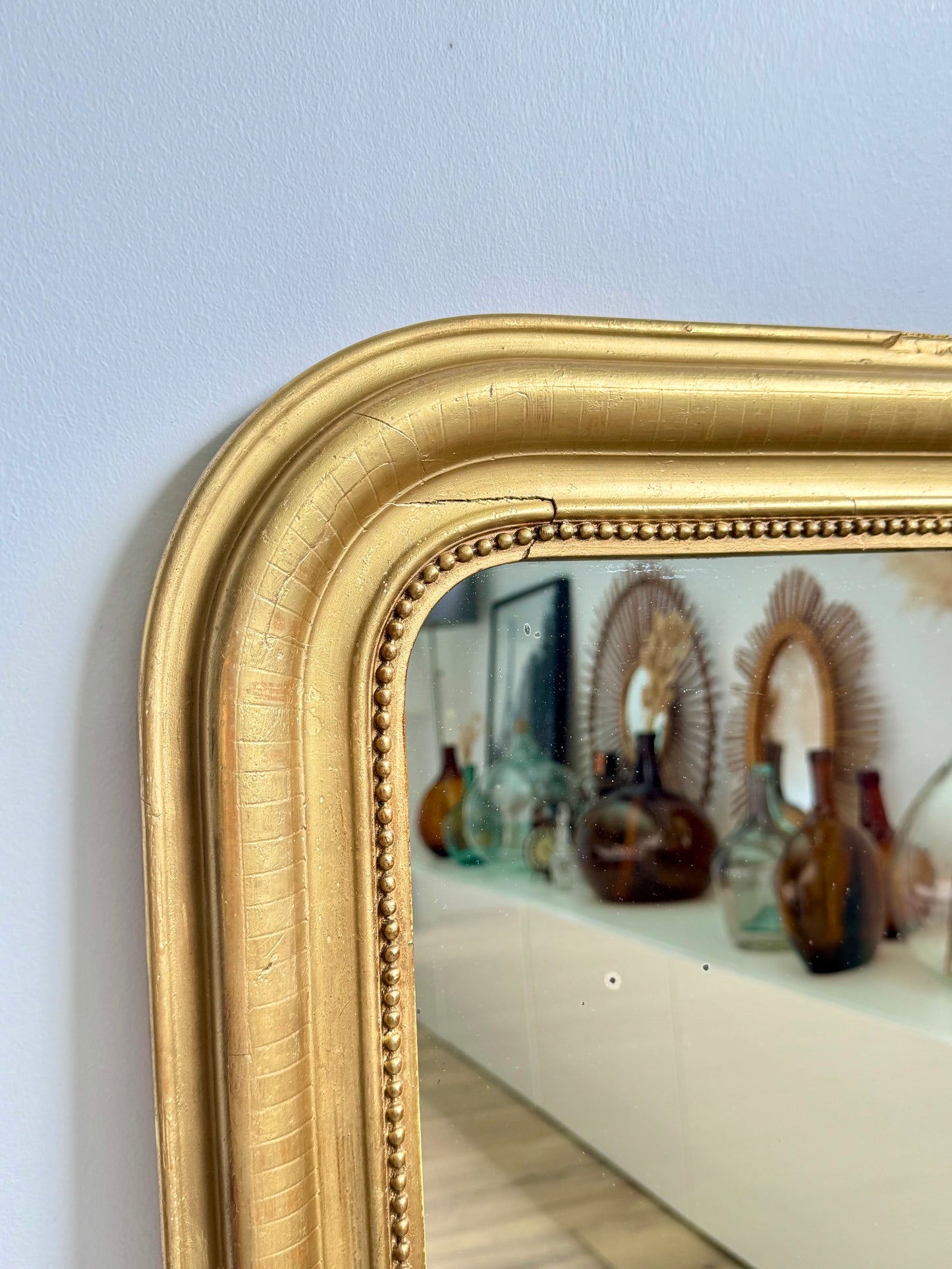Miroir ancien Louis Philippe subtile feuille d’or