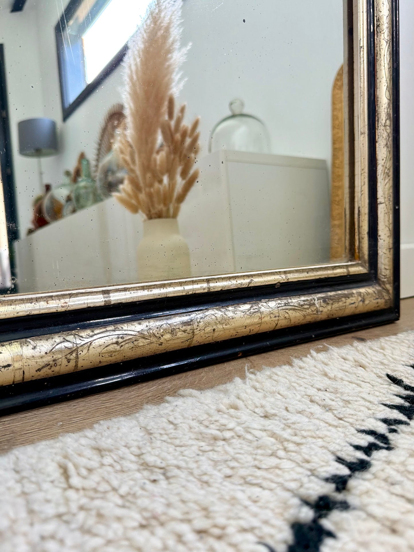 Miroir ancien Louis Philippe doré à la feuille d’or et noir